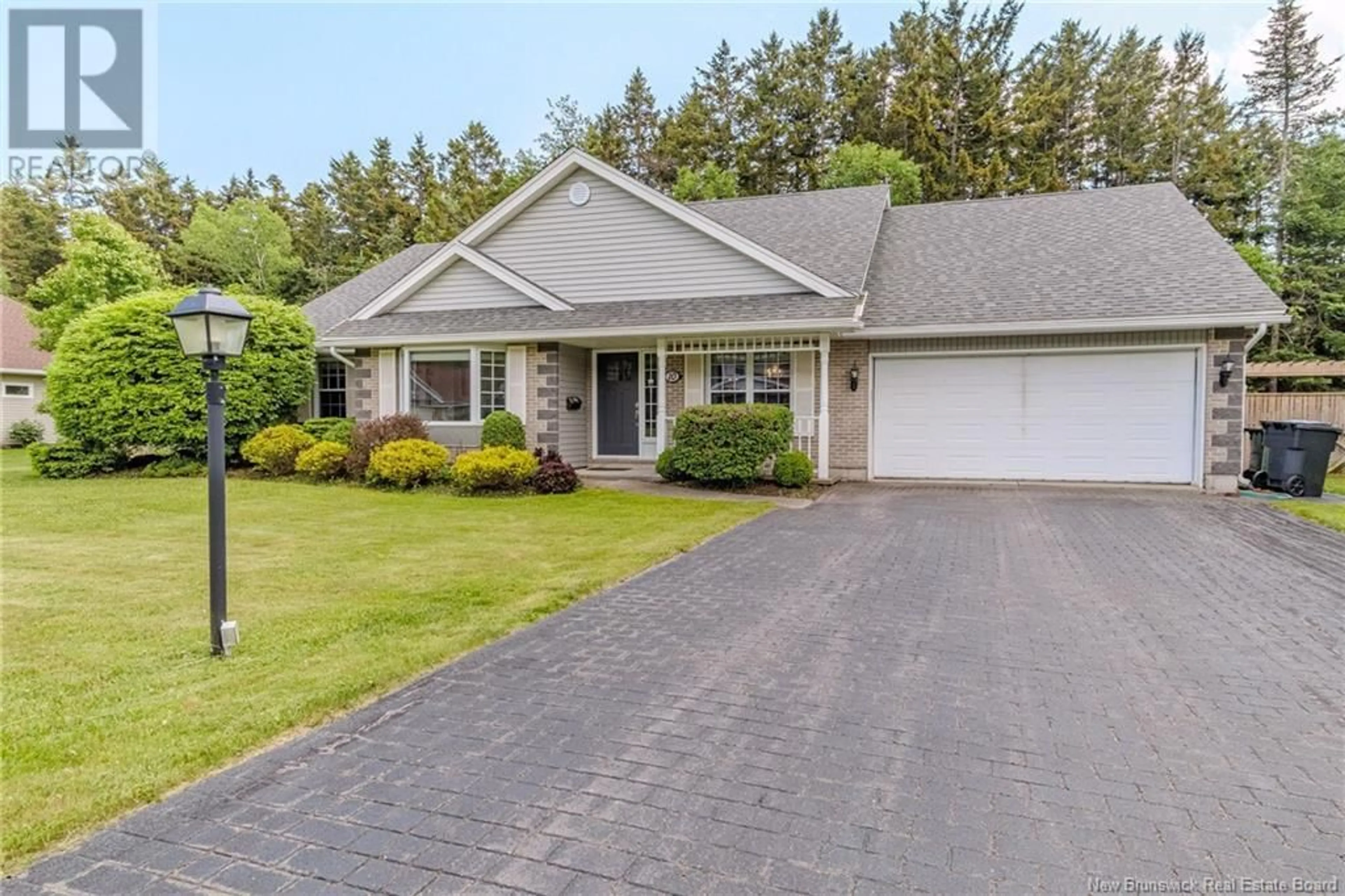 Home with vinyl exterior material, street for 10 POST ROAD, Rothesay New Brunswick E2H2Y3