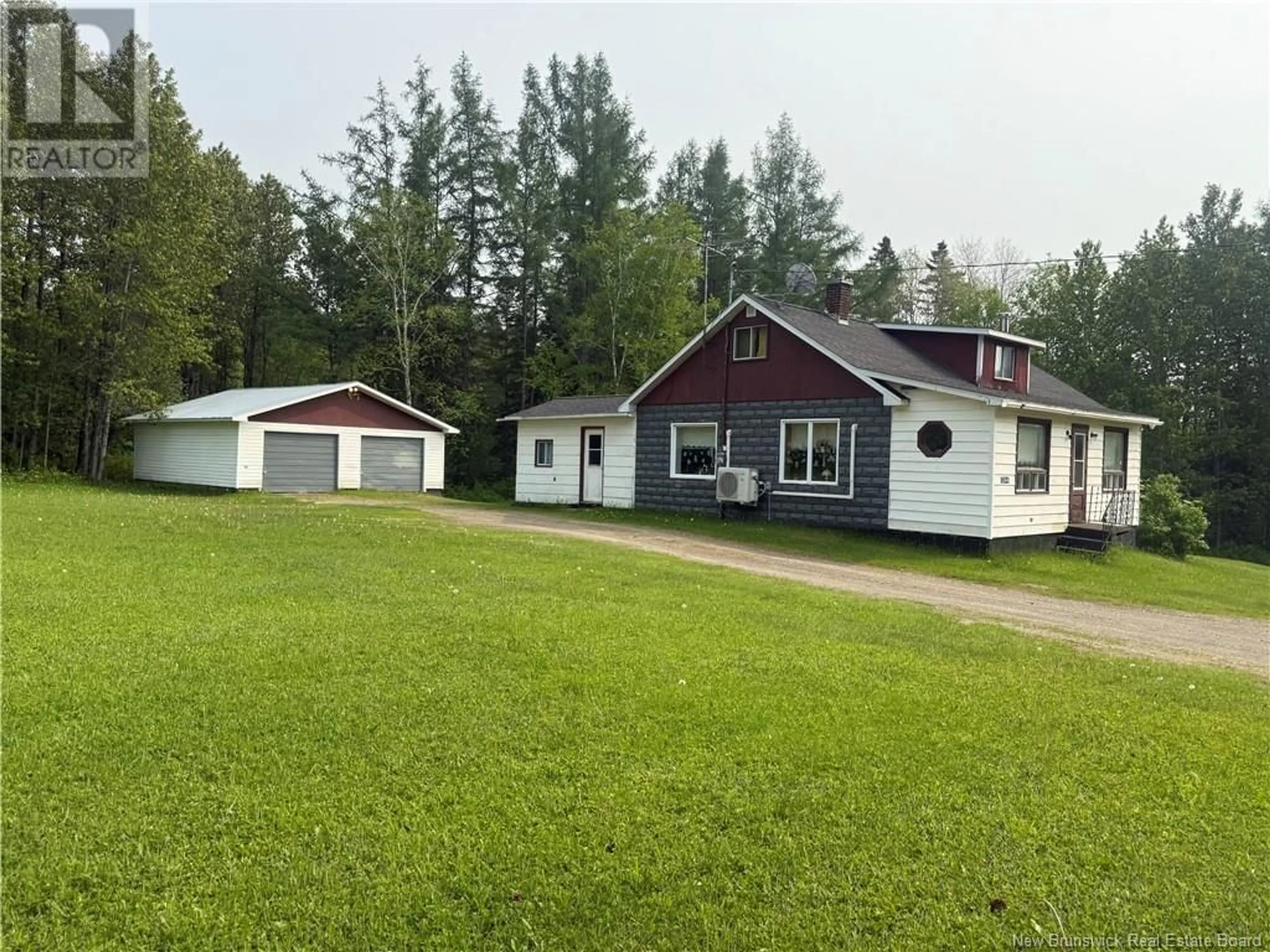 A pic from outside/outdoor area/front of a property/back of a property/a pic from drone, street for 1344 BACK LAKE ROAD, New Denmark New Brunswick E7G4C8
