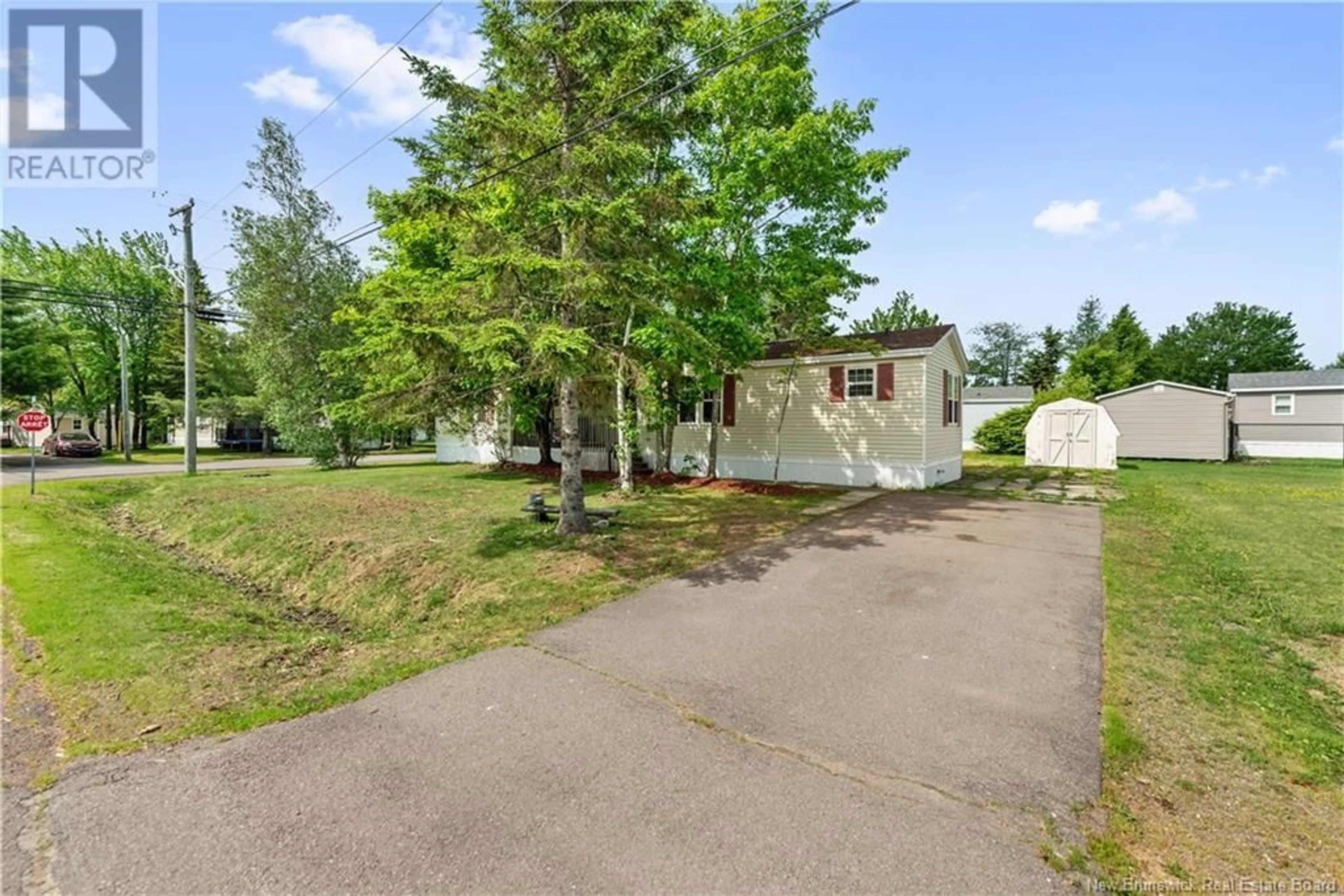 A pic from outside/outdoor area/front of a property/back of a property/a pic from drone, street for 1 HERON STREET, Moncton New Brunswick E1H2W6