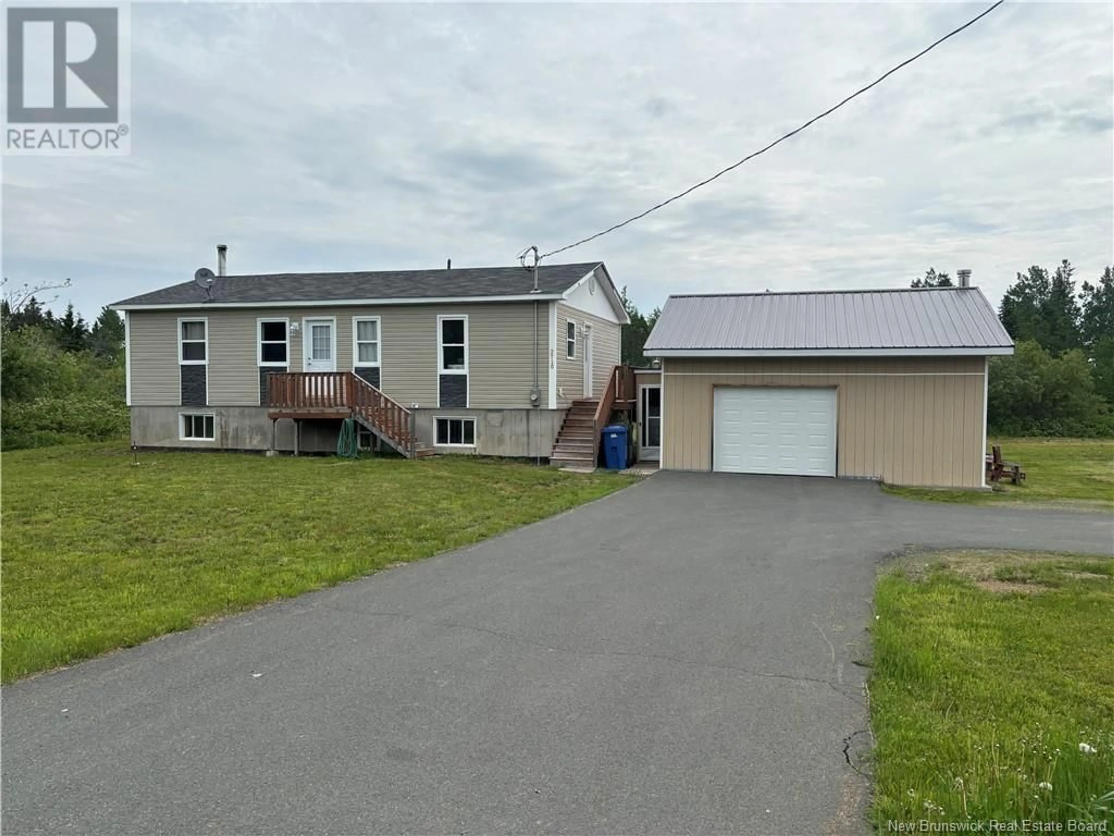 A pic from outside/outdoor area/front of a property/back of a property/a pic from drone, street for 3710 CHEMIN MADISCO, Free Grant New Brunswick E8K3G2
