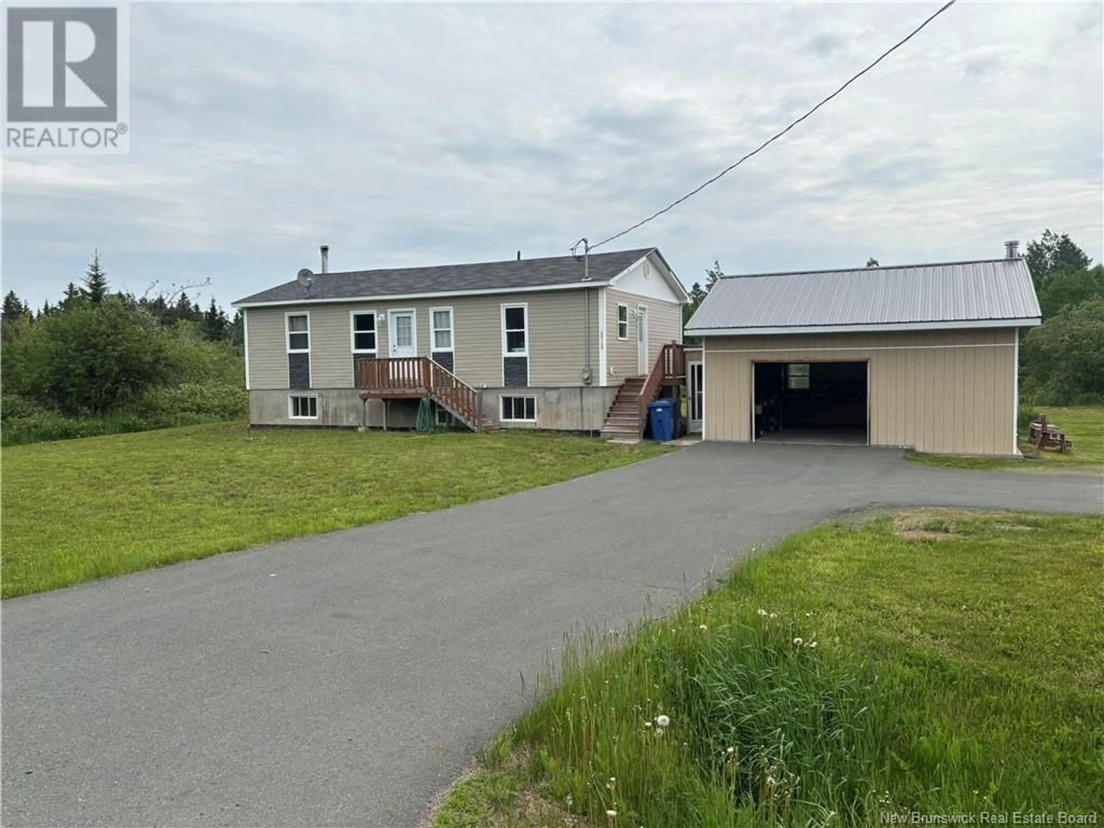 A pic from outside/outdoor area/front of a property/back of a property/a pic from drone, street for 3710 CHEMIN MADISCO, Free Grant New Brunswick E8K3G2