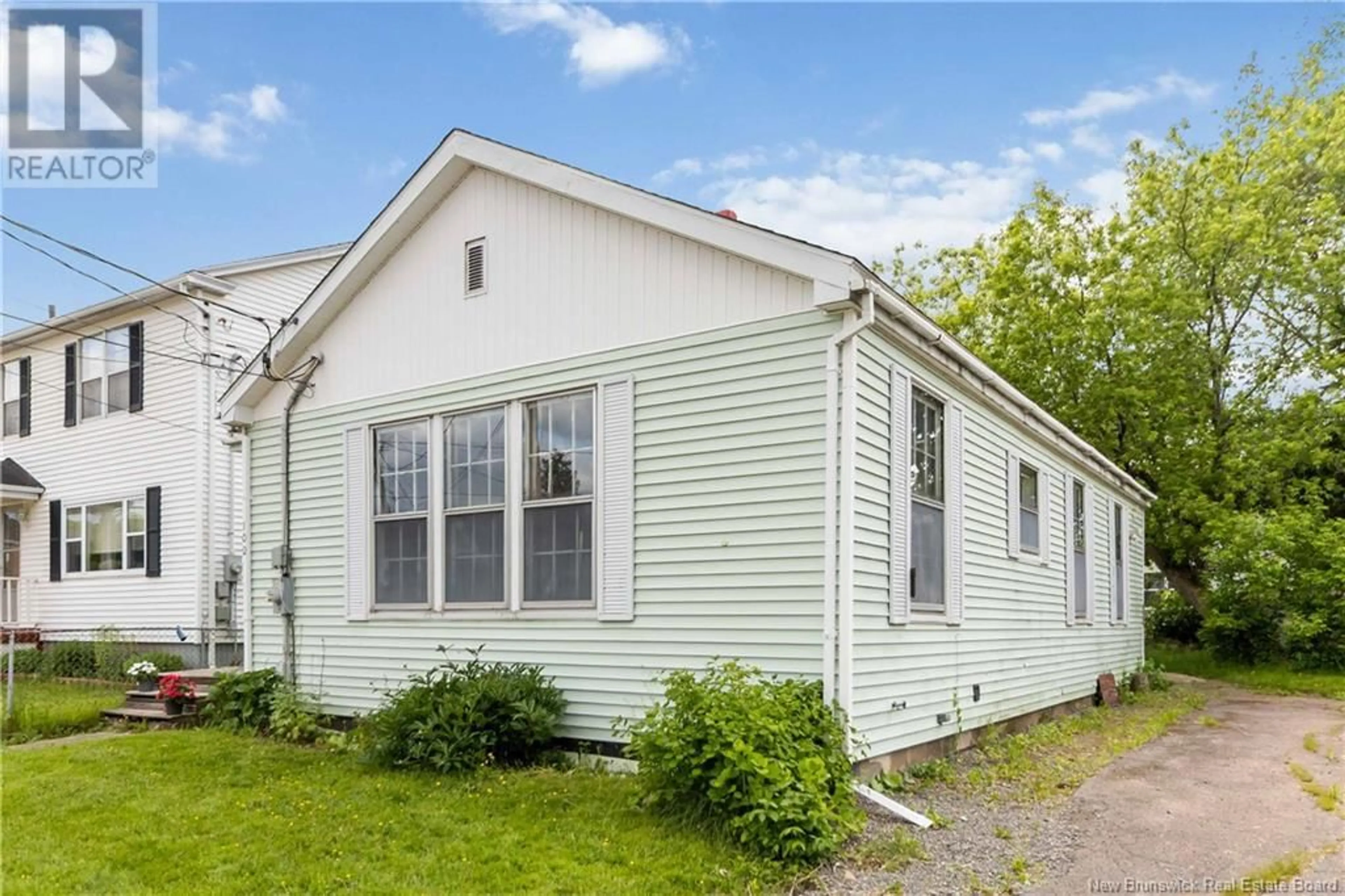 Home with vinyl exterior material, street for 102 MAPLE STREET, Moncton New Brunswick E1C6A3