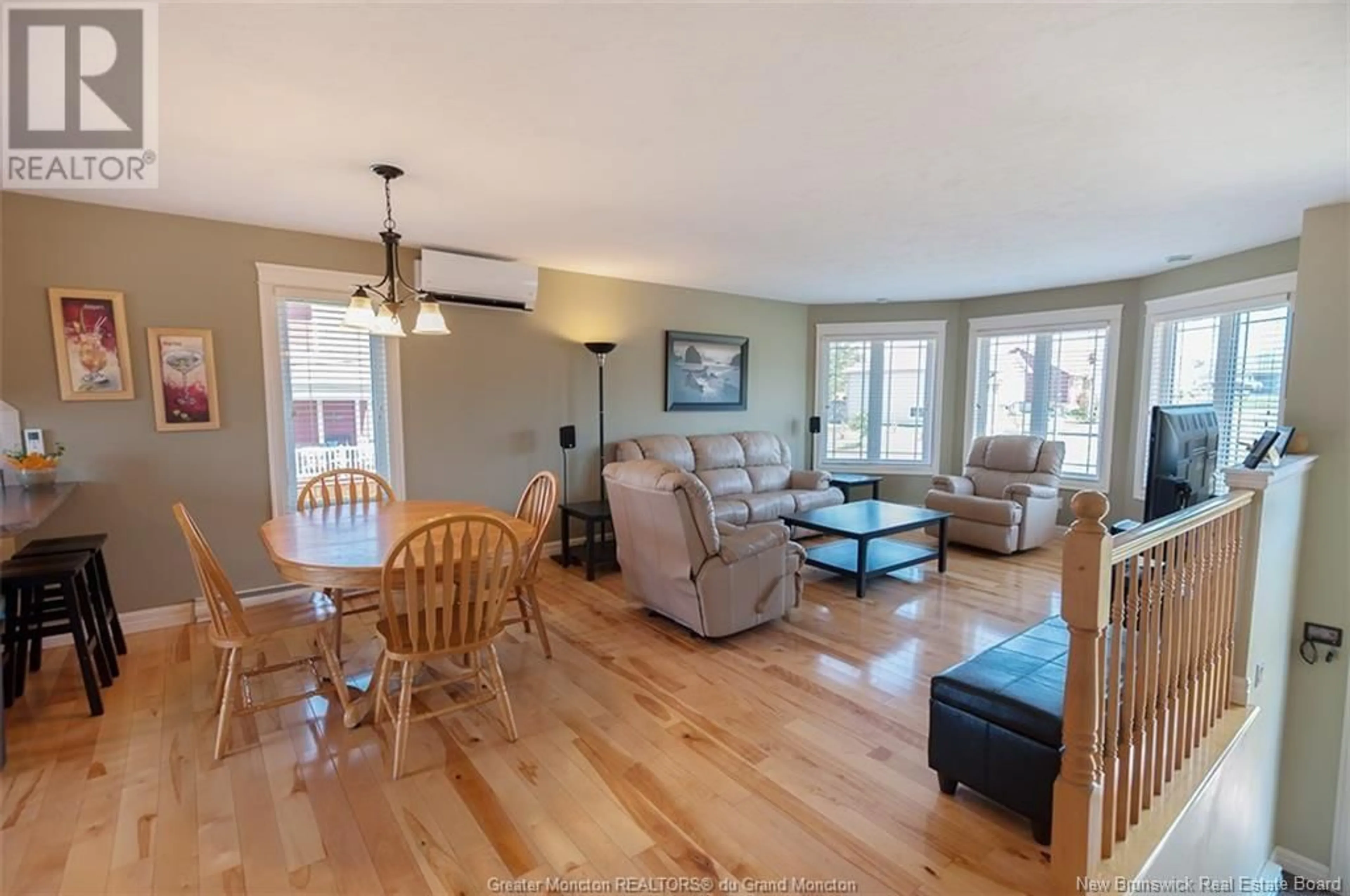 Living room with furniture, wood/laminate floor for 95 SPARTAN COURT, Moncton New Brunswick E1A0J6