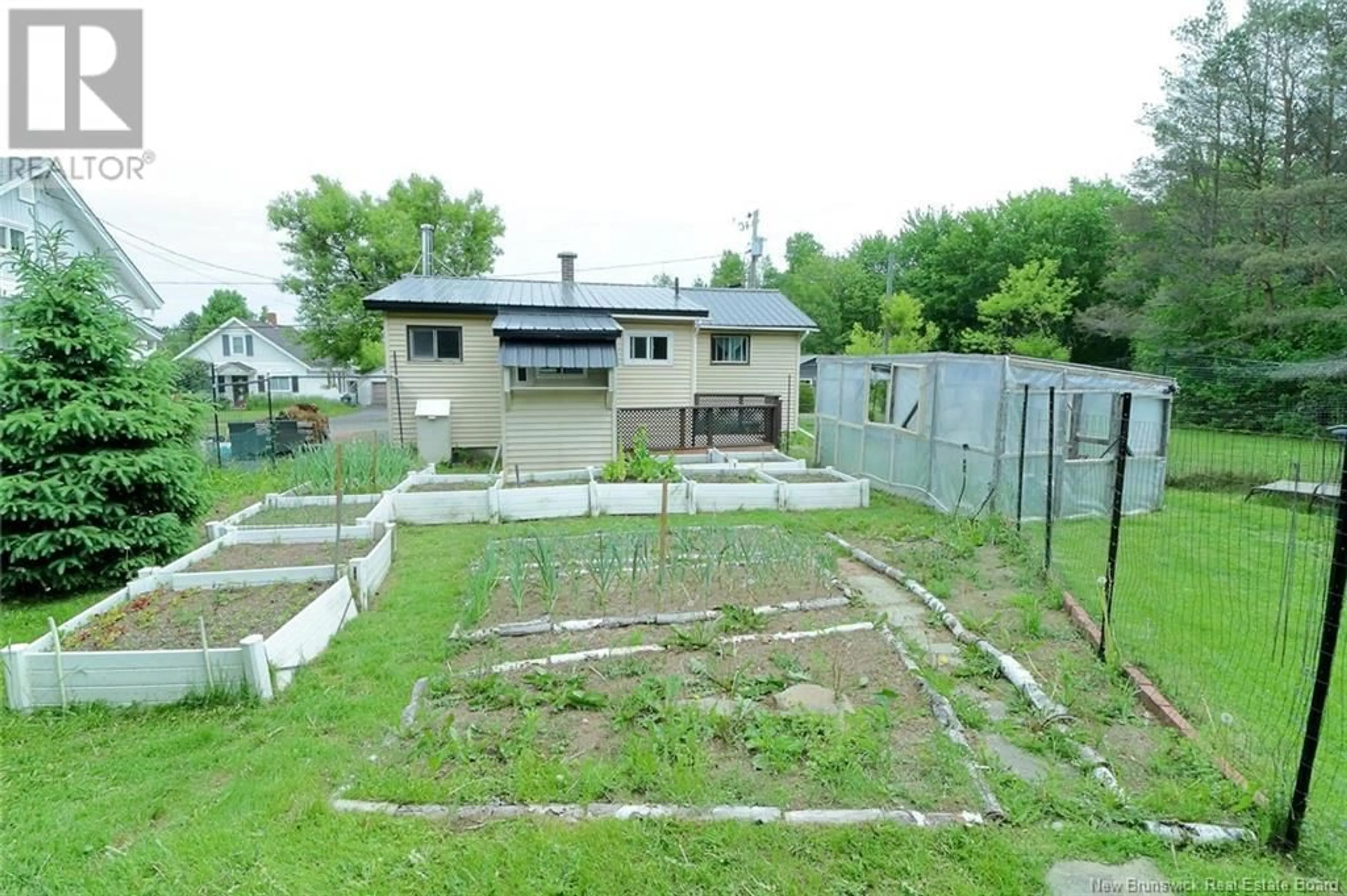 A pic from outside/outdoor area/front of a property/back of a property/a pic from drone, building for 22 SMYTHE STREET, Chipman New Brunswick E4A2N7