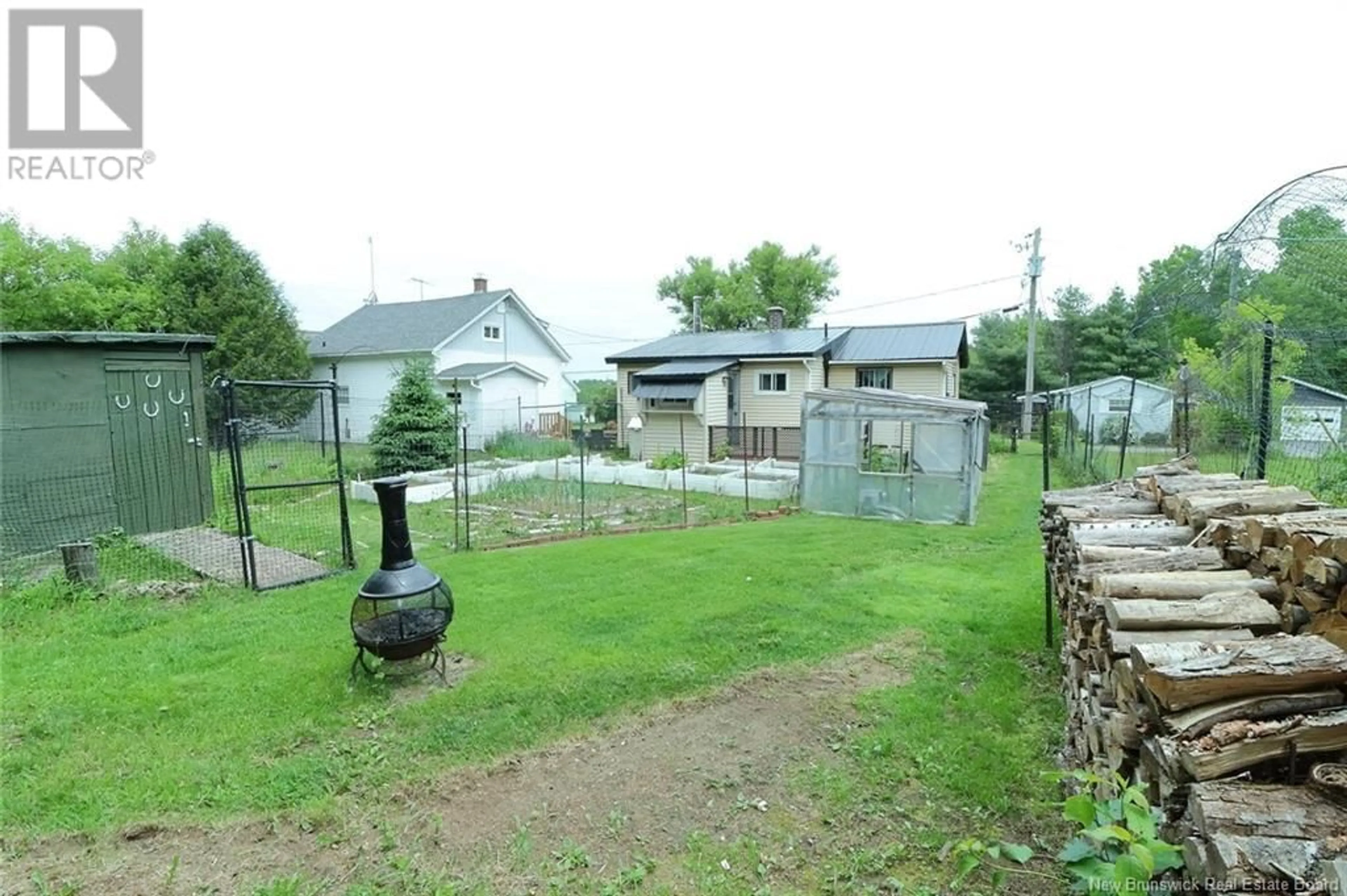 A pic from outside/outdoor area/front of a property/back of a property/a pic from drone, street for 22 SMYTHE STREET, Chipman New Brunswick E4A2N7