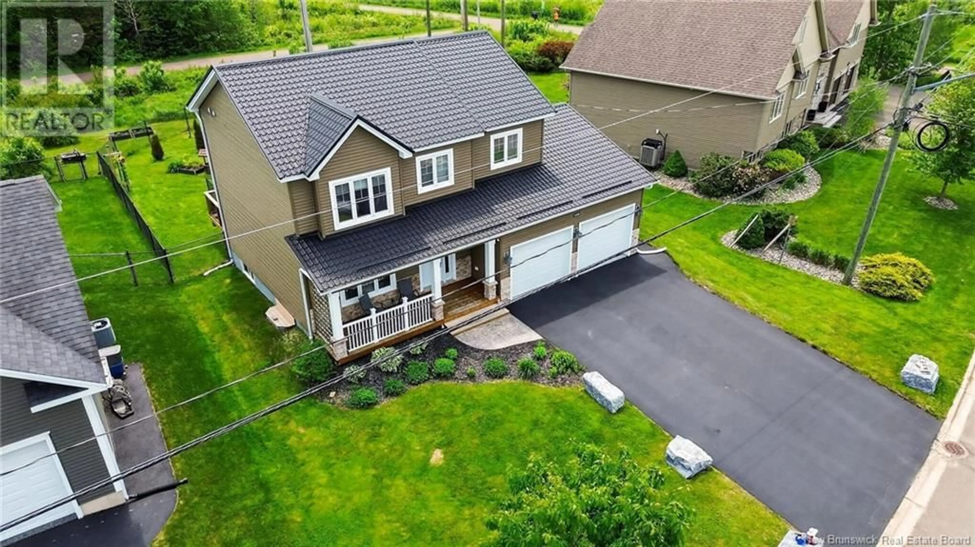 A pic from outside/outdoor area/front of a property/back of a property/a pic from drone, street for 146 HOLLAND DRIVE, Moncton New Brunswick E1G0W1