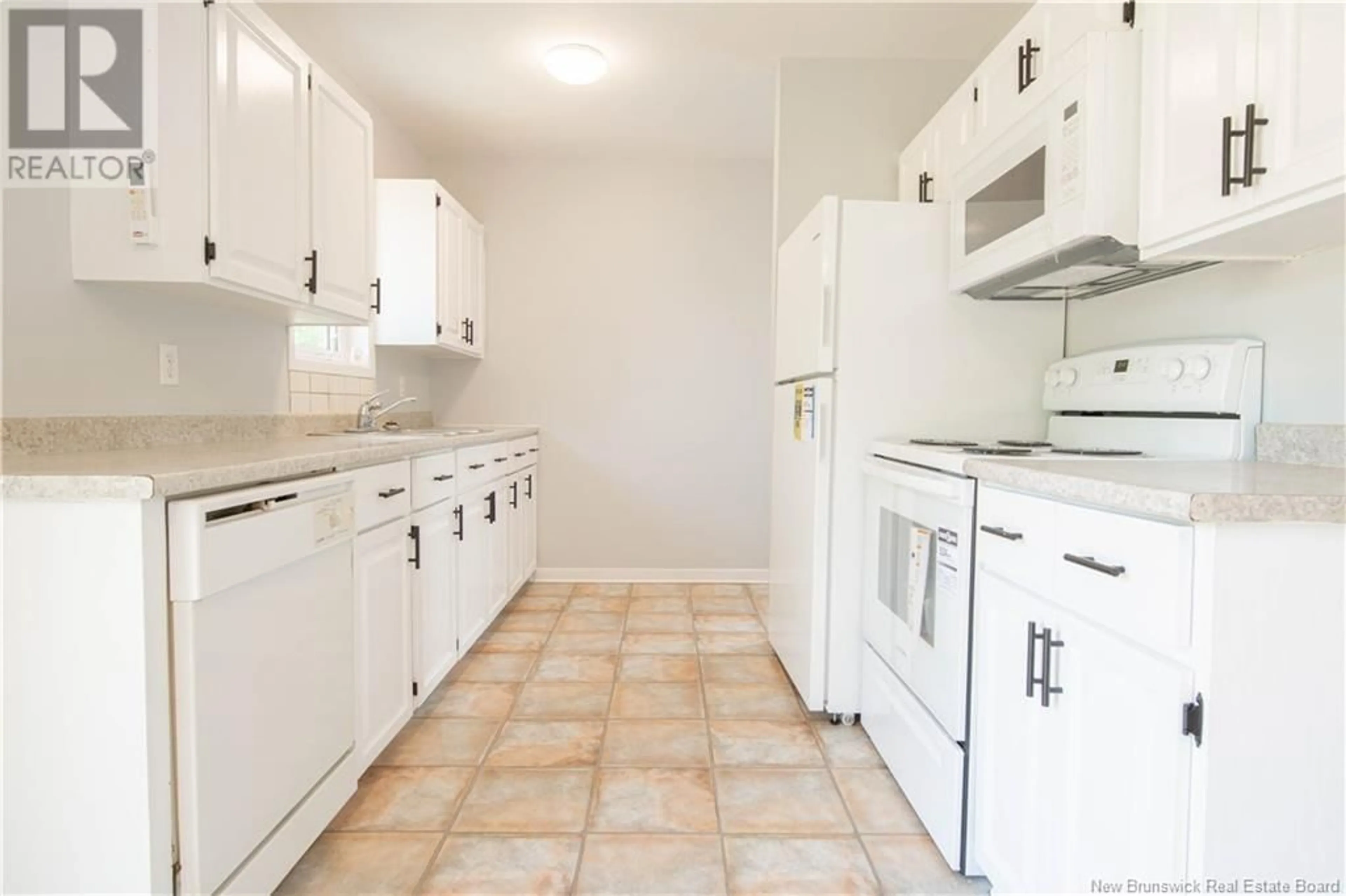 Standard kitchen, ceramic/tile floor for 65 GREEN BRIAR DRIVE, Boundary Creek New Brunswick E1G4B6