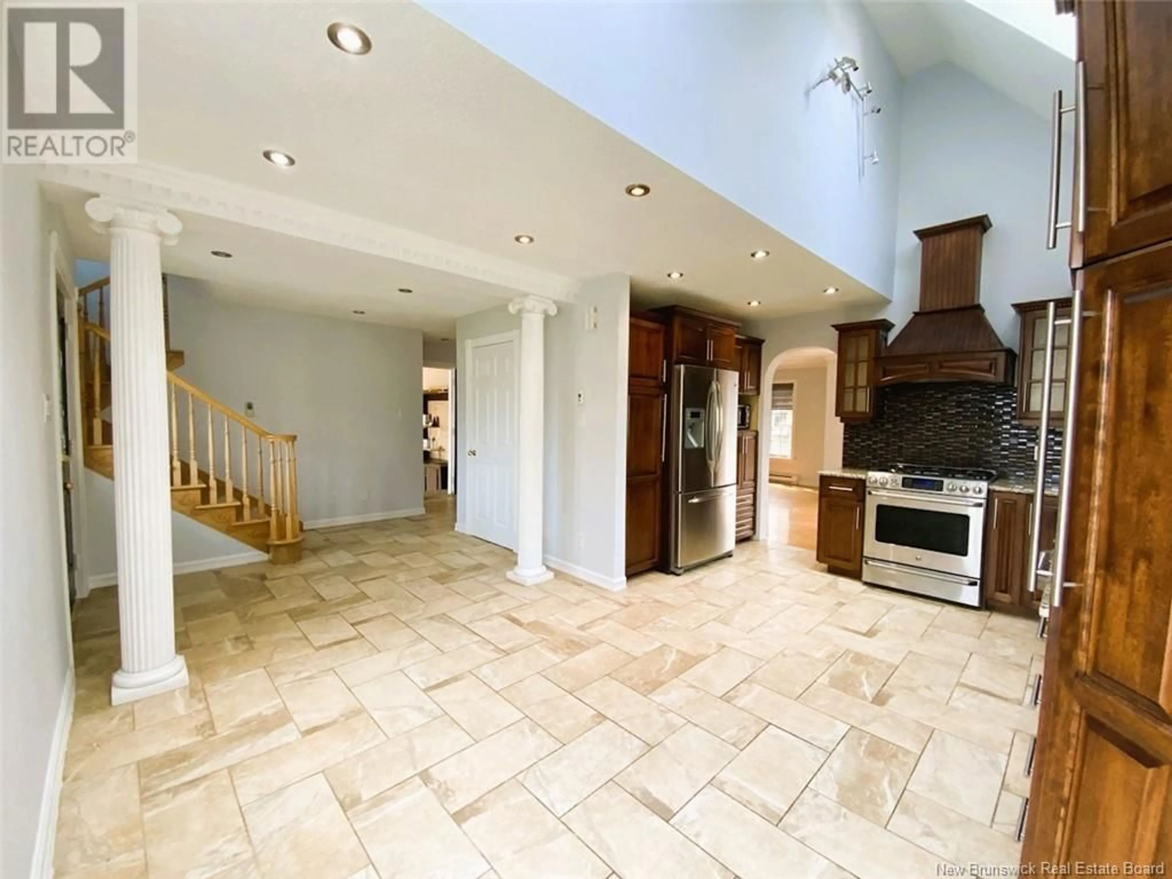 Open concept kitchen, ceramic/tile floor for 42 THIBAUDEAU AVENUE, Edmundston New Brunswick E3V4Z1