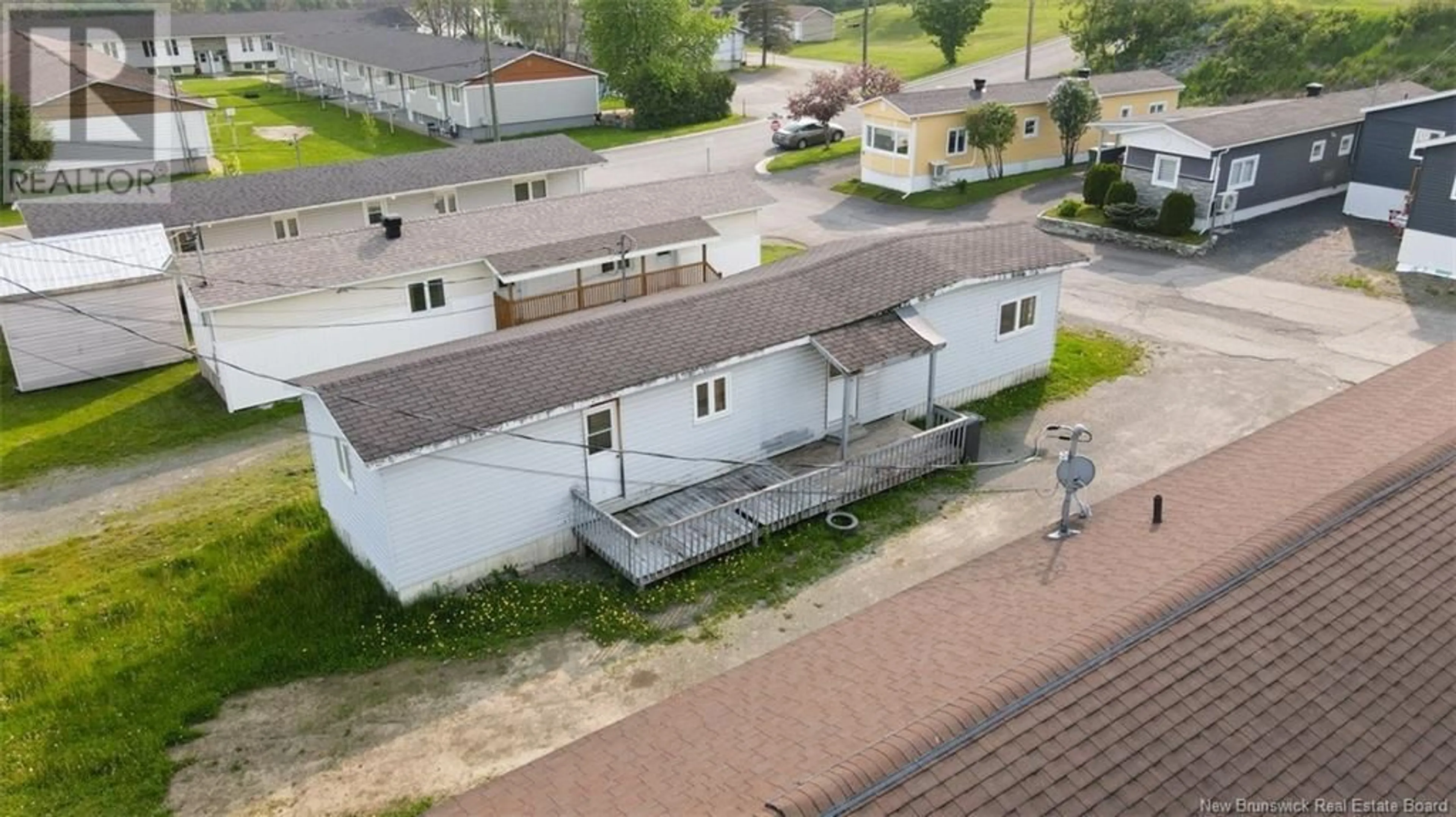 A pic from outside/outdoor area/front of a property/back of a property/a pic from drone, building for 5 GAGNON AVENUE, Edmundston New Brunswick E3V3H8