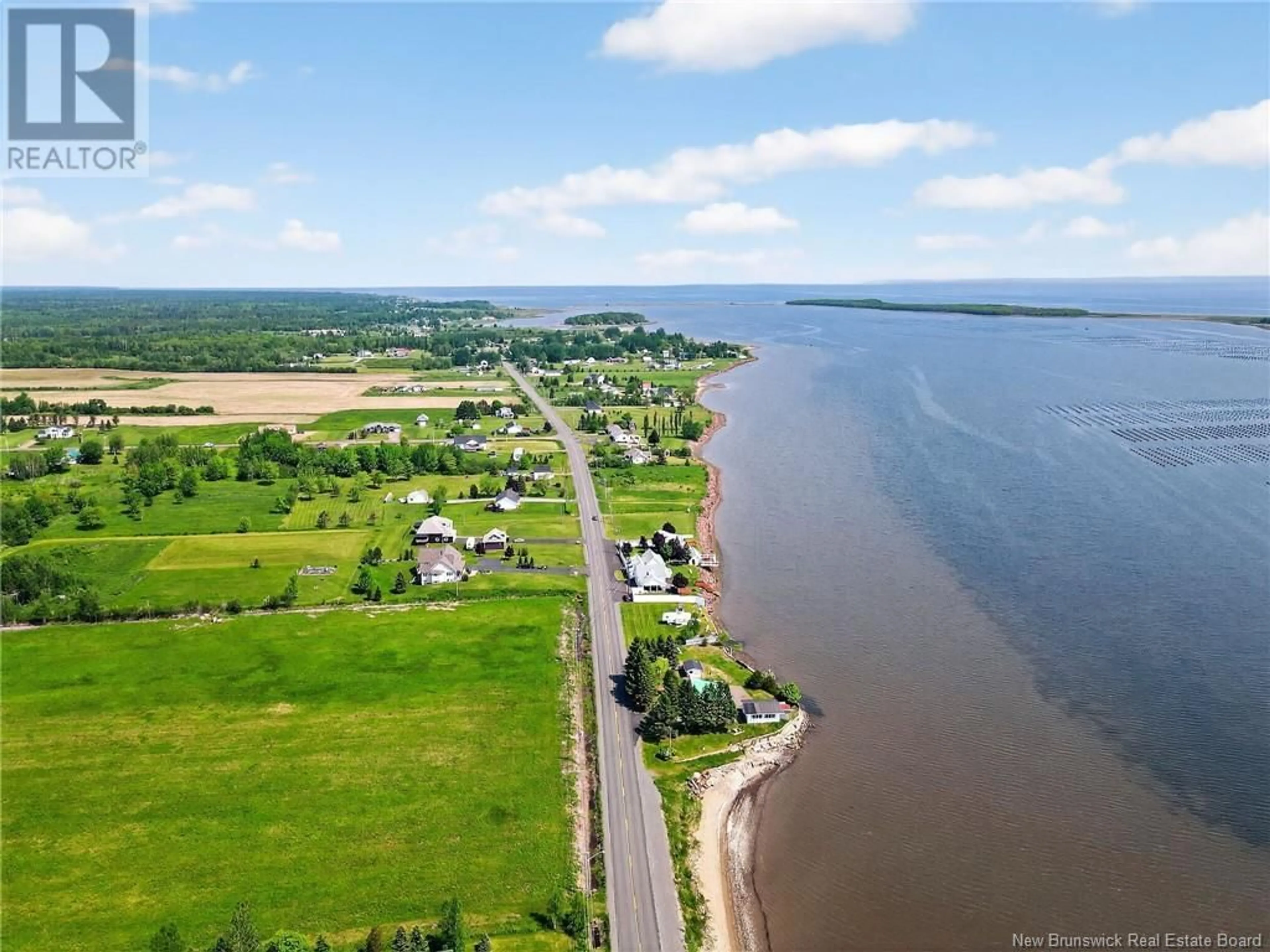A pic from outside/outdoor area/front of a property/back of a property/a pic from drone, water/lake/river/ocean view for 2490 RTE 535, Cocagne New Brunswick E4R3J2