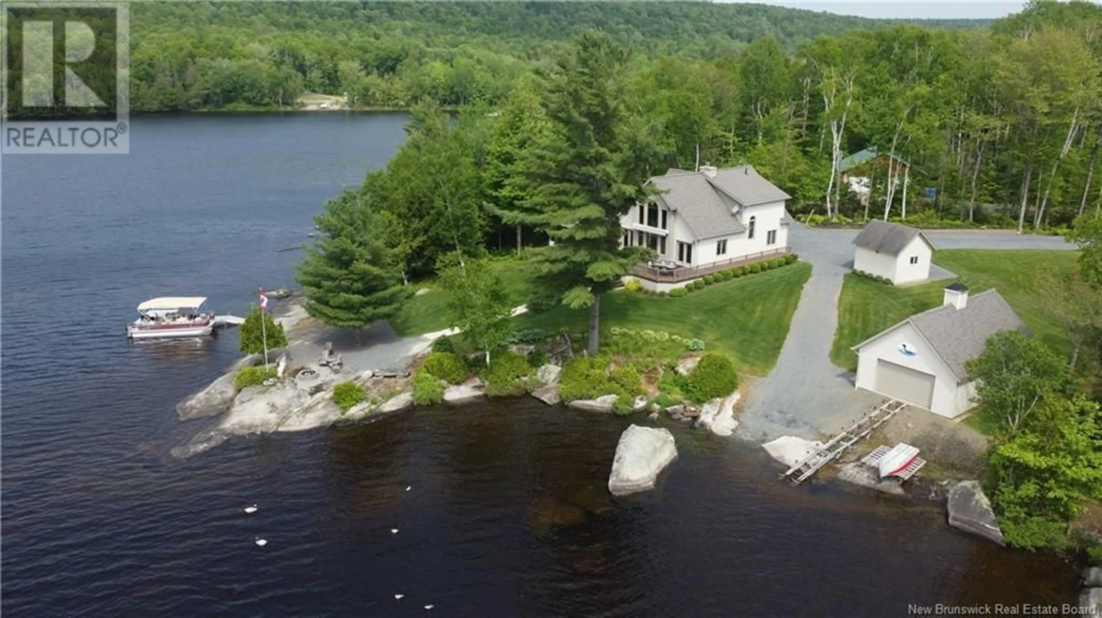 A pic from outside/outdoor area/front of a property/back of a property/a pic from drone, water/lake/river/ocean view for 14 FAULKNER LANE, Eel River Lake New Brunswick E6H0B4