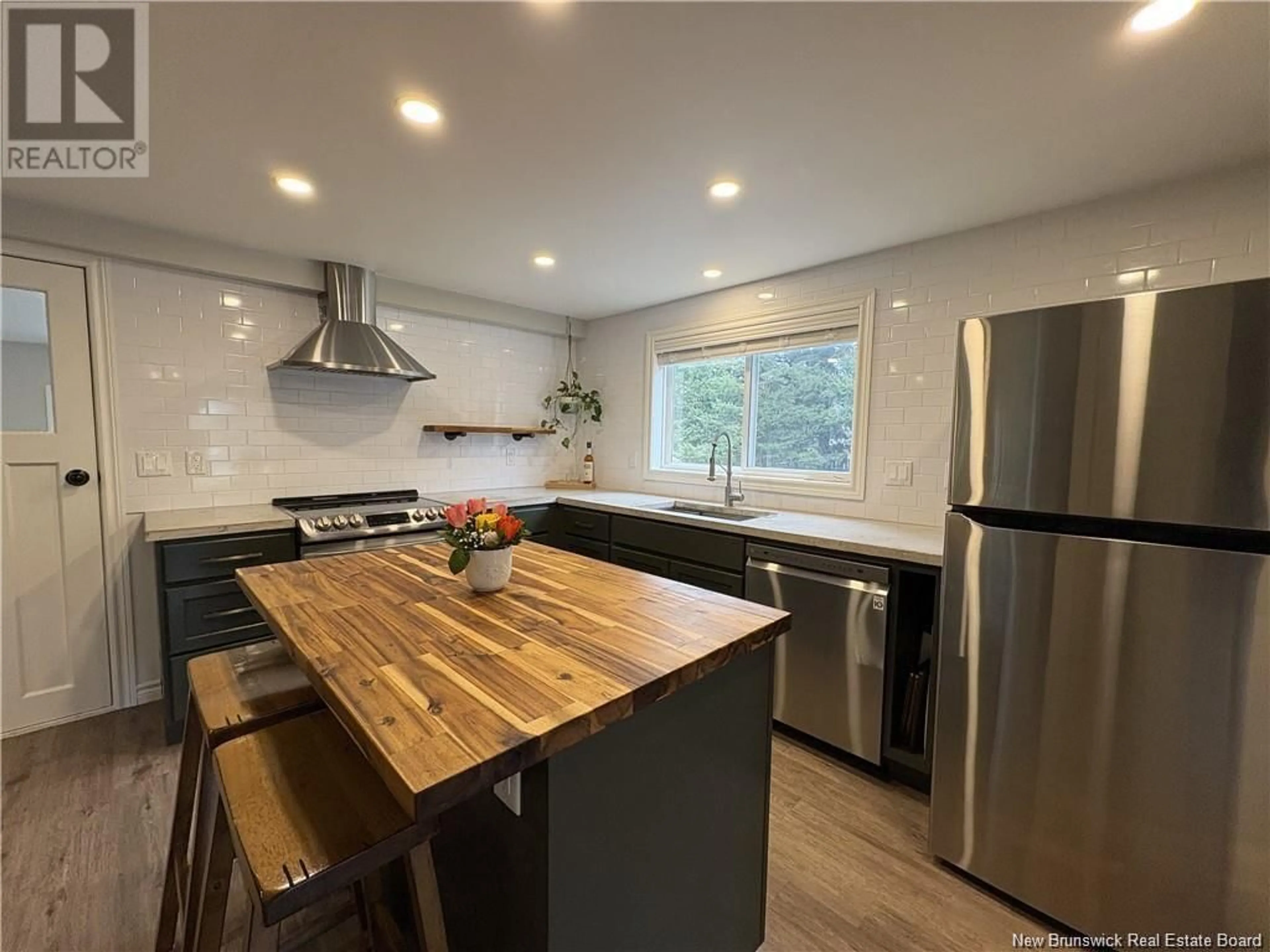 Open concept kitchen, wood/laminate floor for 31 WALKER, Sackville New Brunswick E4L3K4