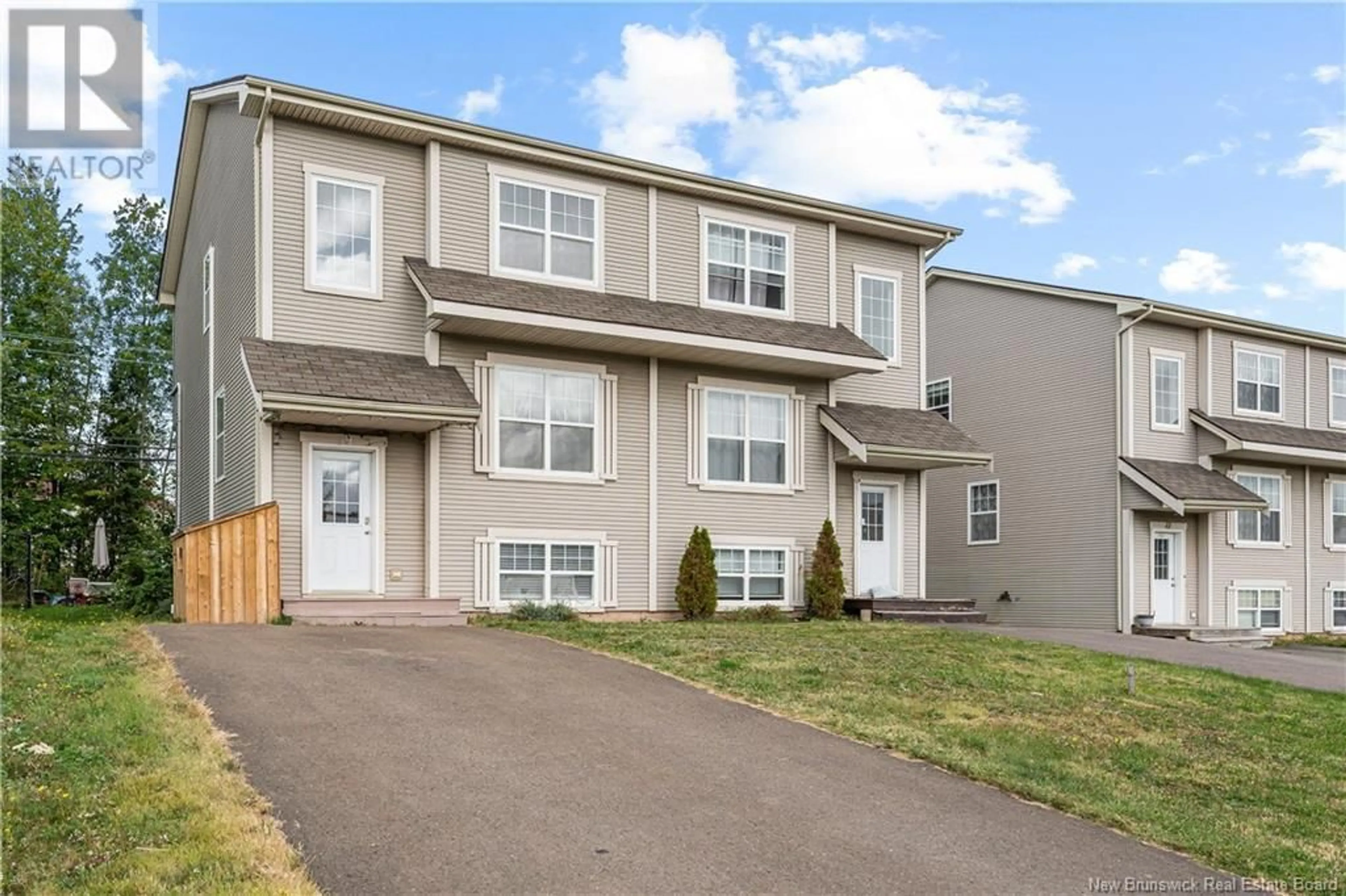 Home with vinyl exterior material, street for 39 SUNSHINE DRIVE, Moncton New Brunswick E1G2A3