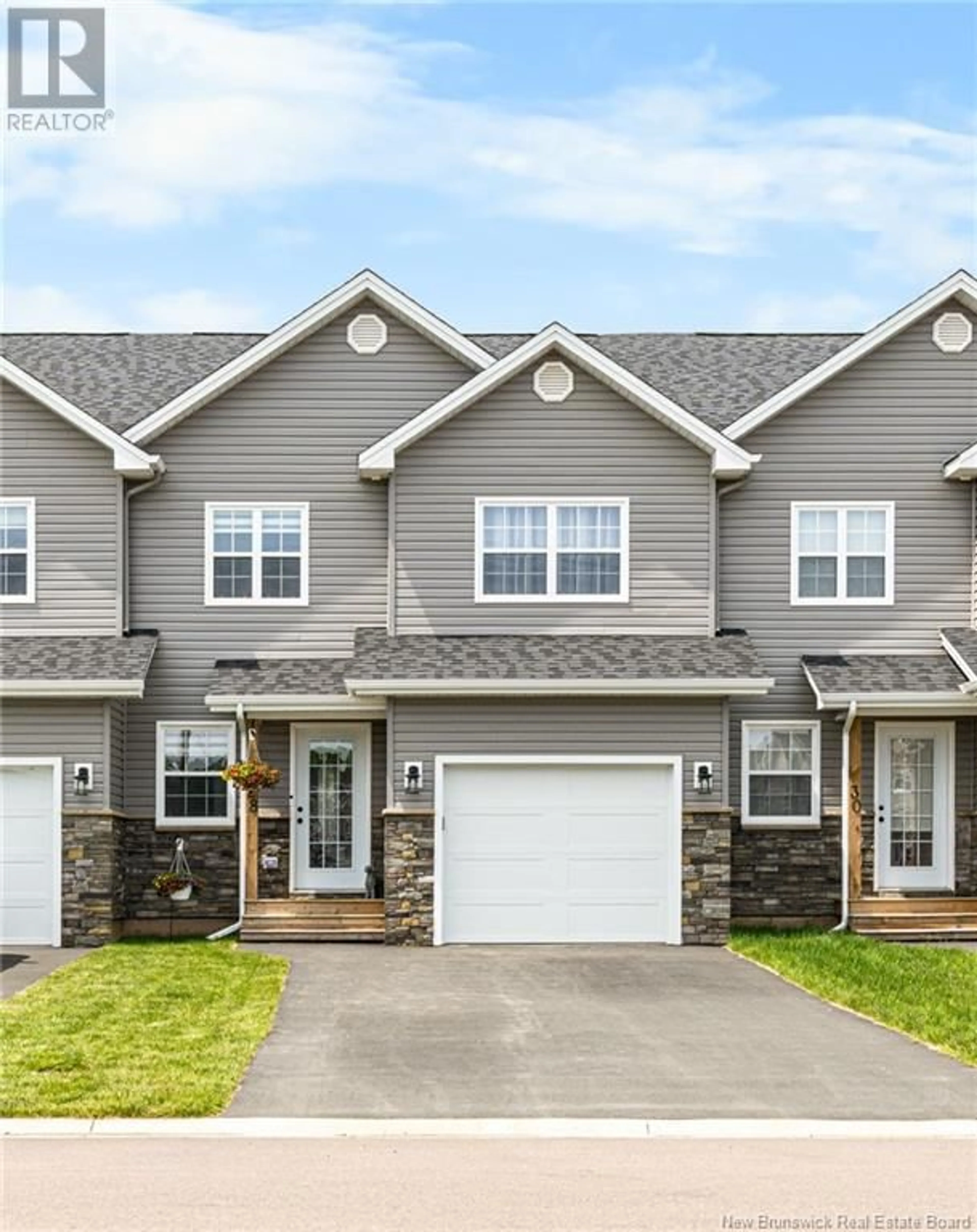Home with vinyl exterior material, street for 28 LOUDUN STREET, Dieppe New Brunswick E1A9X4