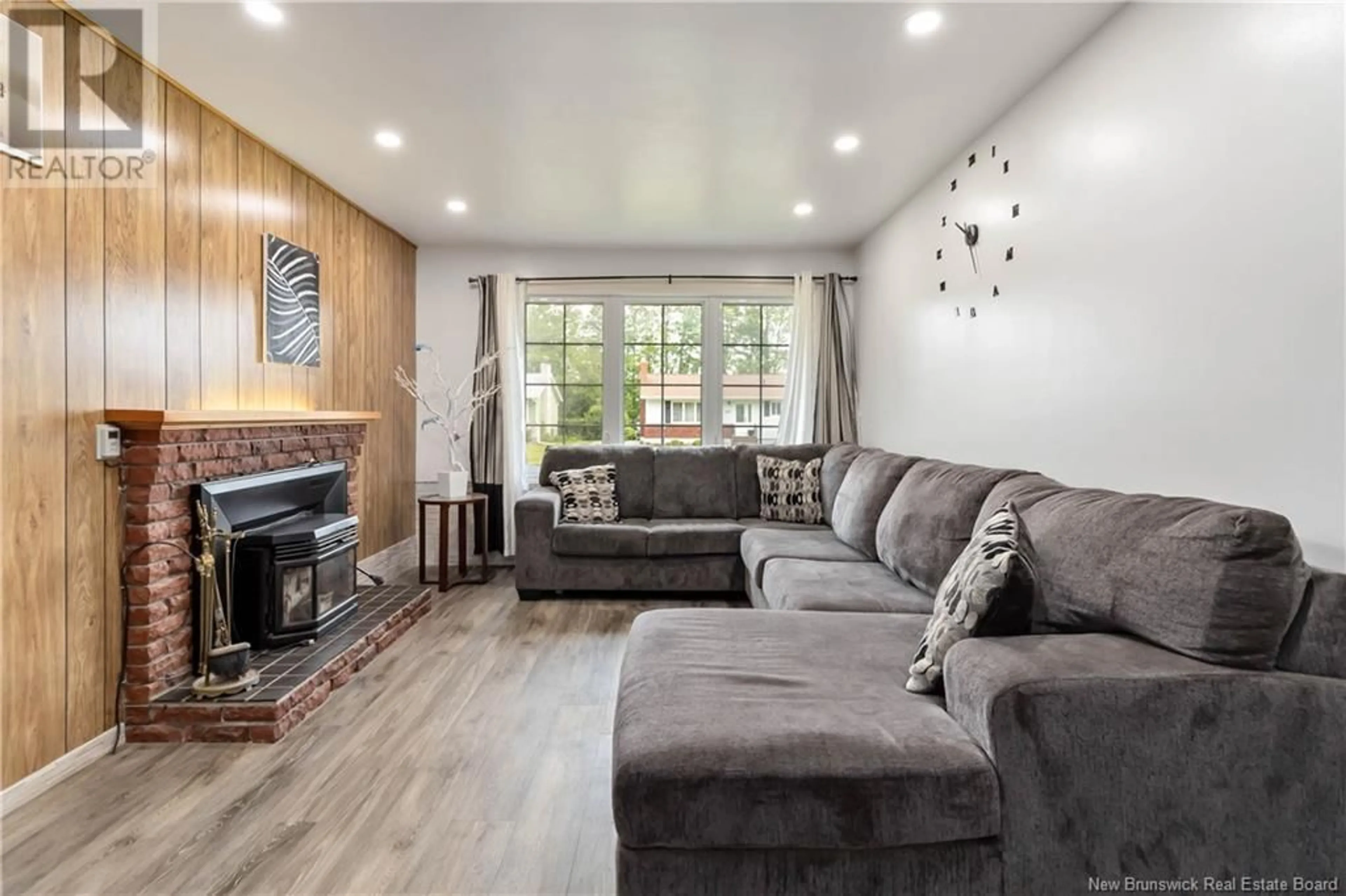 Living room with furniture, wood/laminate floor for 31 WESTVIEW TERRACE, Riverview New Brunswick E1B3S2