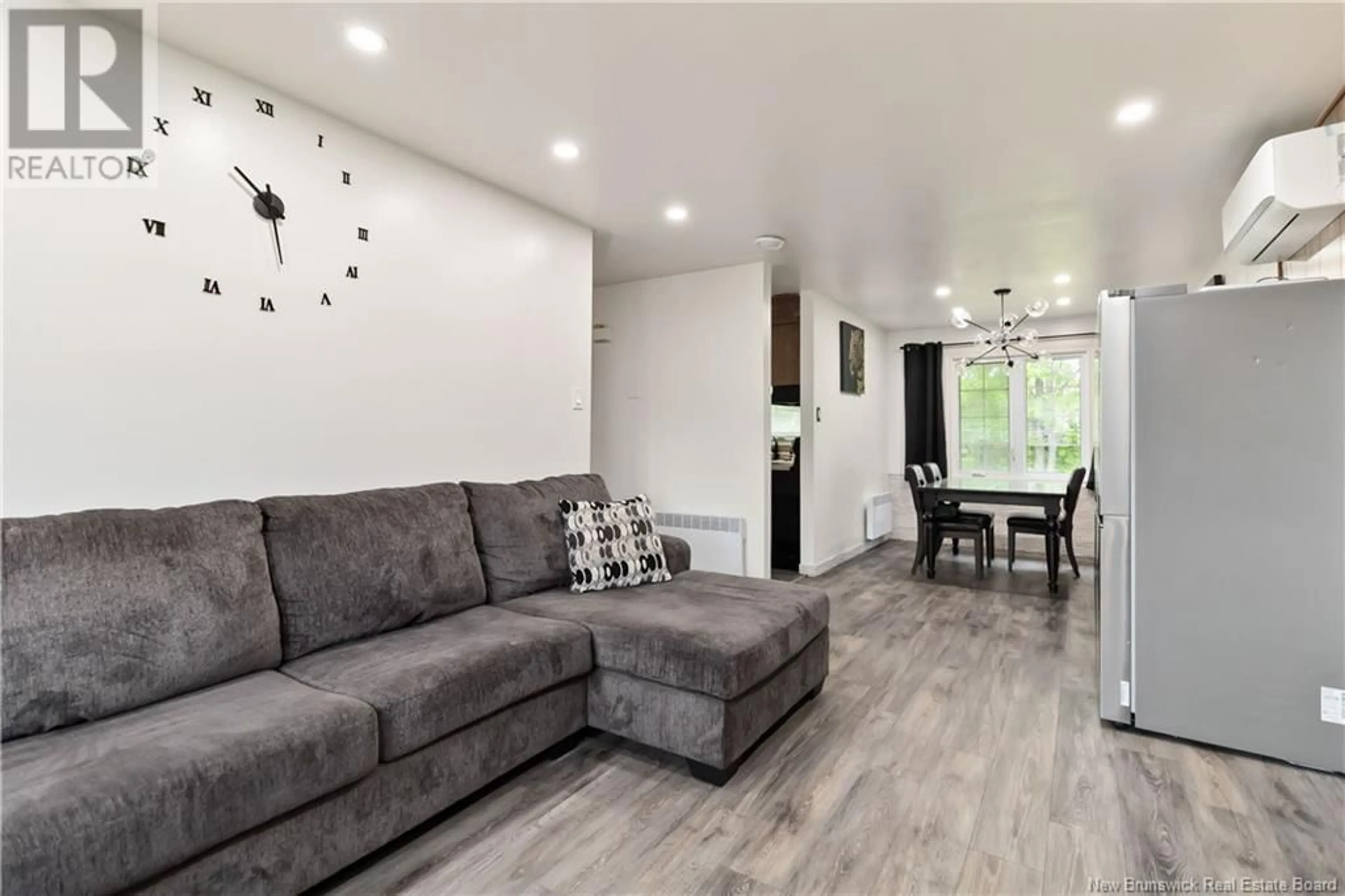 Living room with furniture, wood/laminate floor for 31 WESTVIEW TERRACE, Riverview New Brunswick E1B3S2