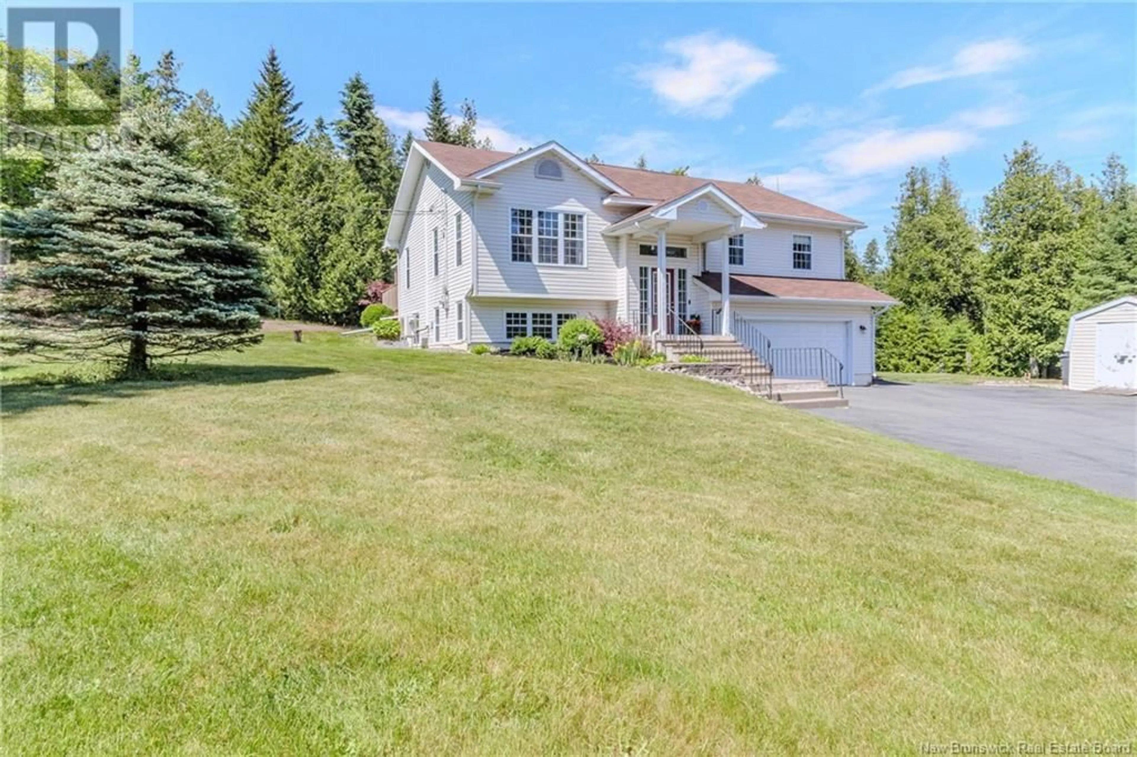 A pic from outside/outdoor area/front of a property/back of a property/a pic from drone, street for 107 ELLIOT ROAD, Quispamsis New Brunswick E2G2B7