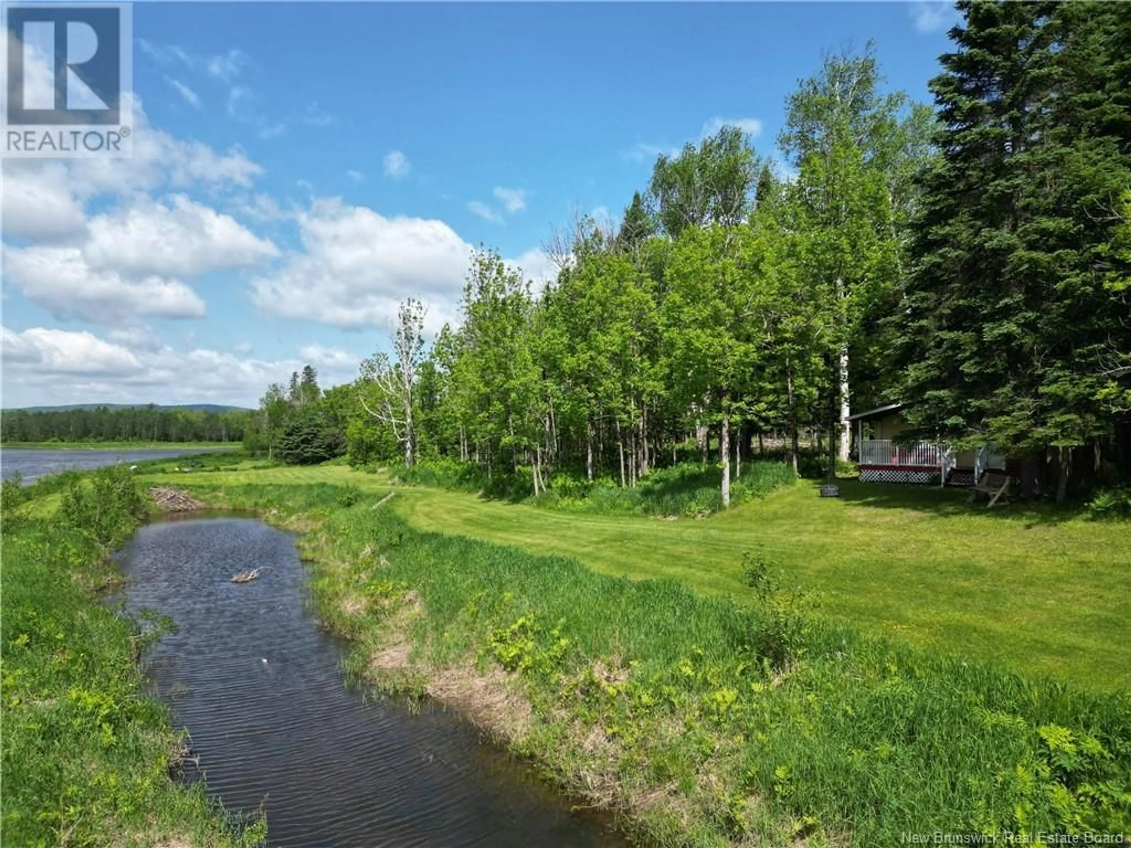 A pic from outside/outdoor area/front of a property/back of a property/a pic from drone, water/lake/river/ocean view for 126 - 120 JENKINS ROAD, Burntland Brook New Brunswick E7G1W4