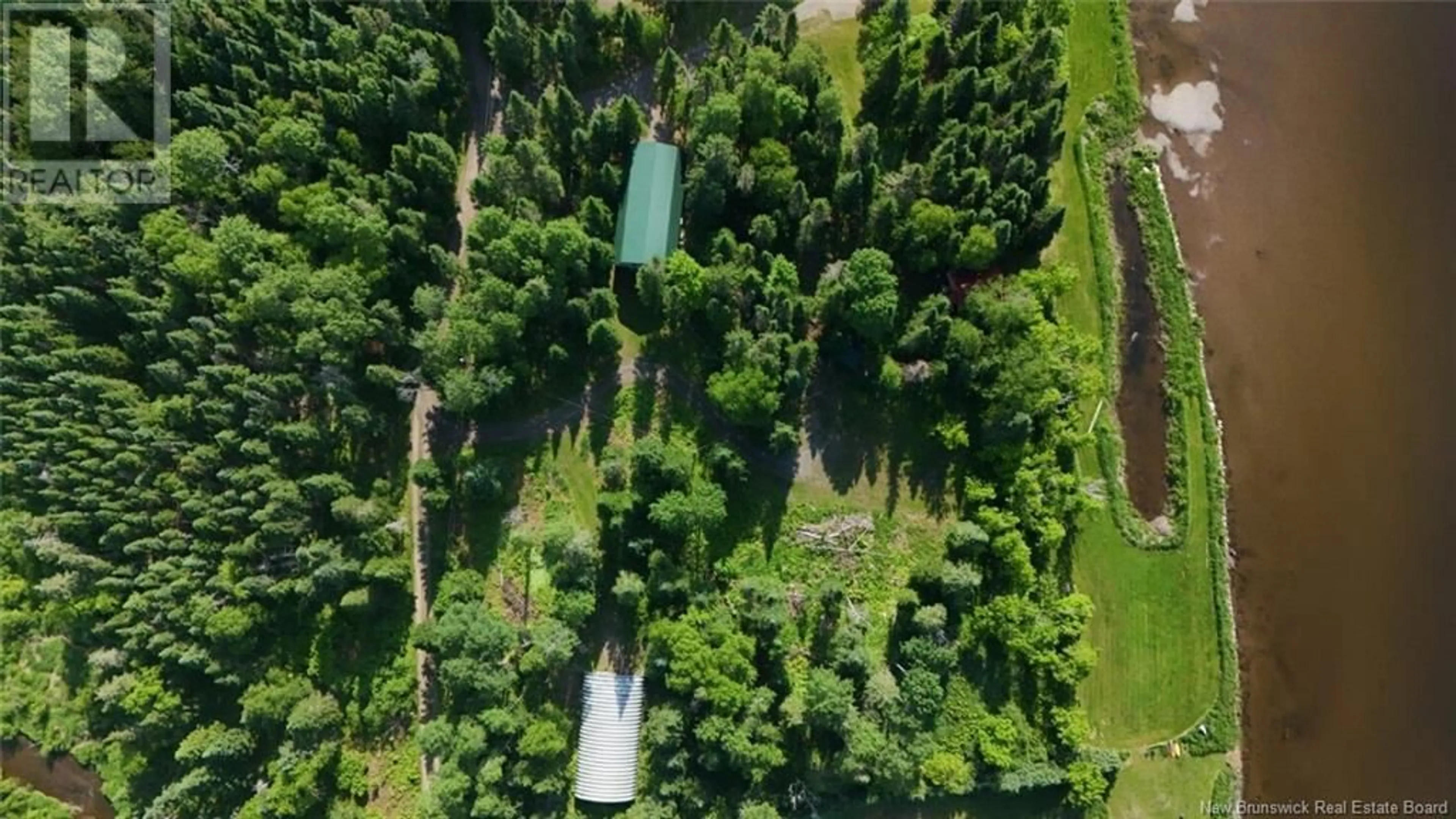 A pic from outside/outdoor area/front of a property/back of a property/a pic from drone, forest/trees view for 126 - 120 JENKINS ROAD, Burntland Brook New Brunswick E7G1W4