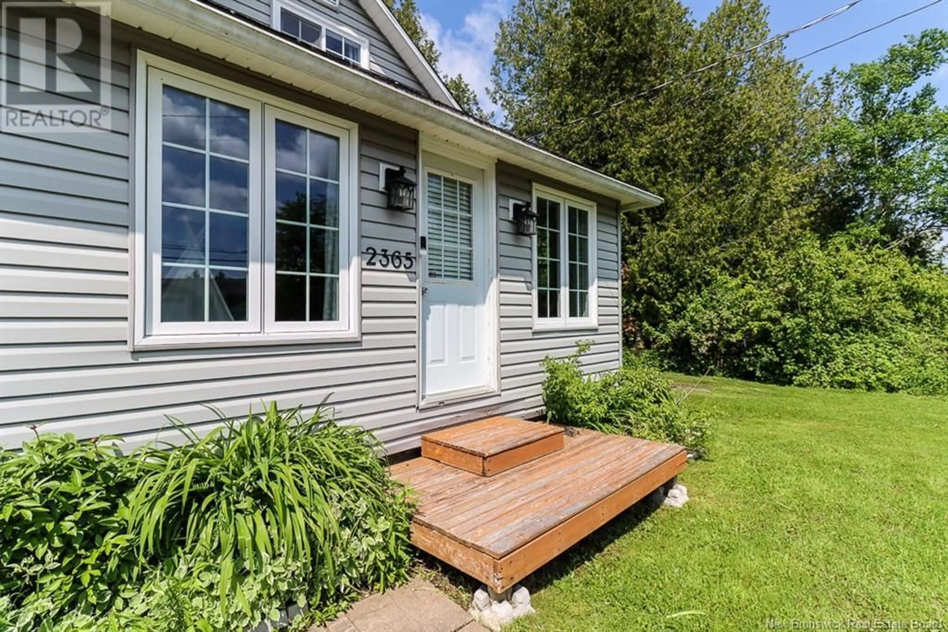 Home with vinyl exterior material, street for 2365 WESTFIELD ROAD, Saint John New Brunswick E2M6J4