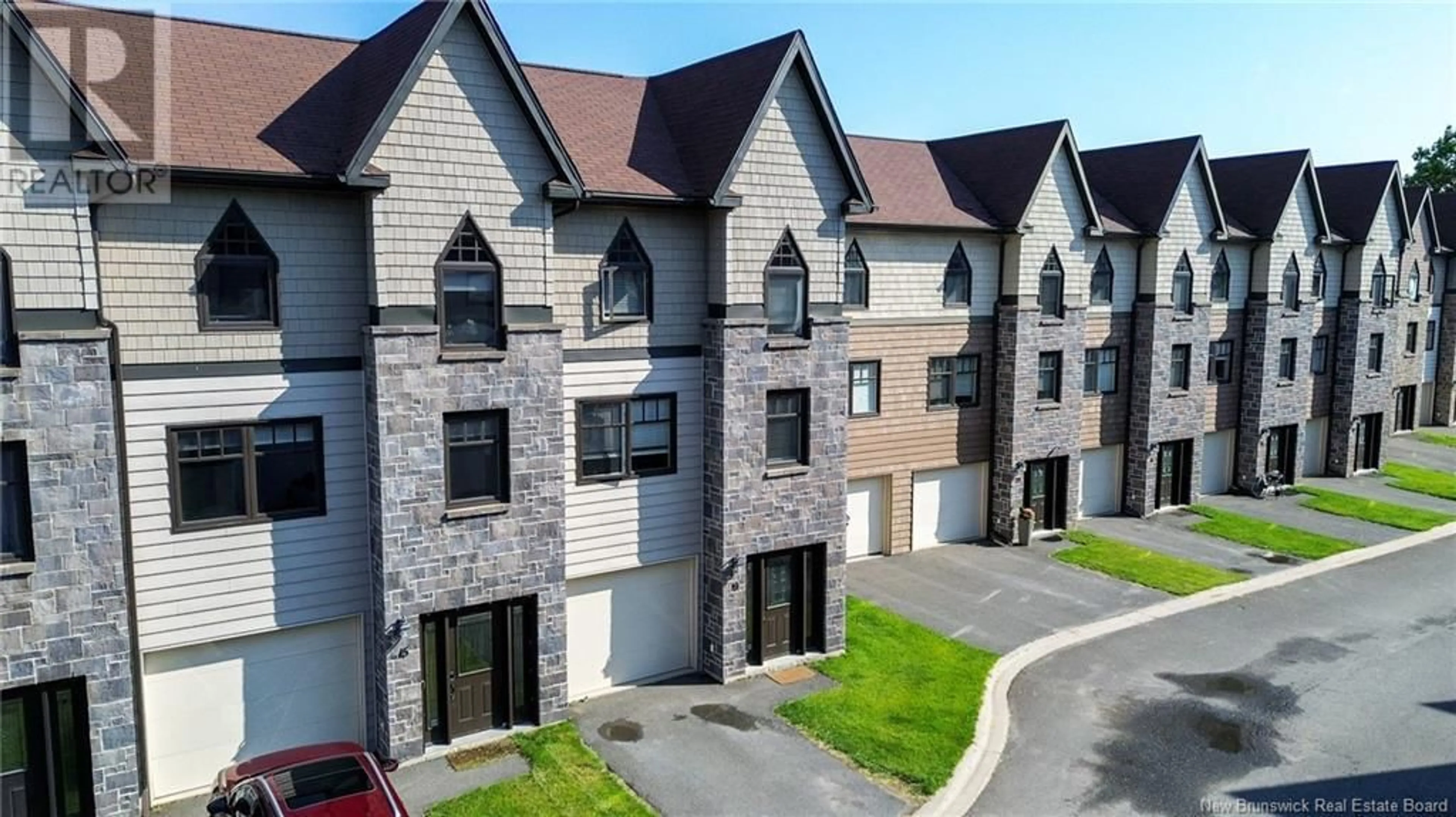 A pic from outside/outdoor area/front of a property/back of a property/a pic from drone, street for 19 BROWNSTONE LANE, Fredericton New Brunswick E3A7M4