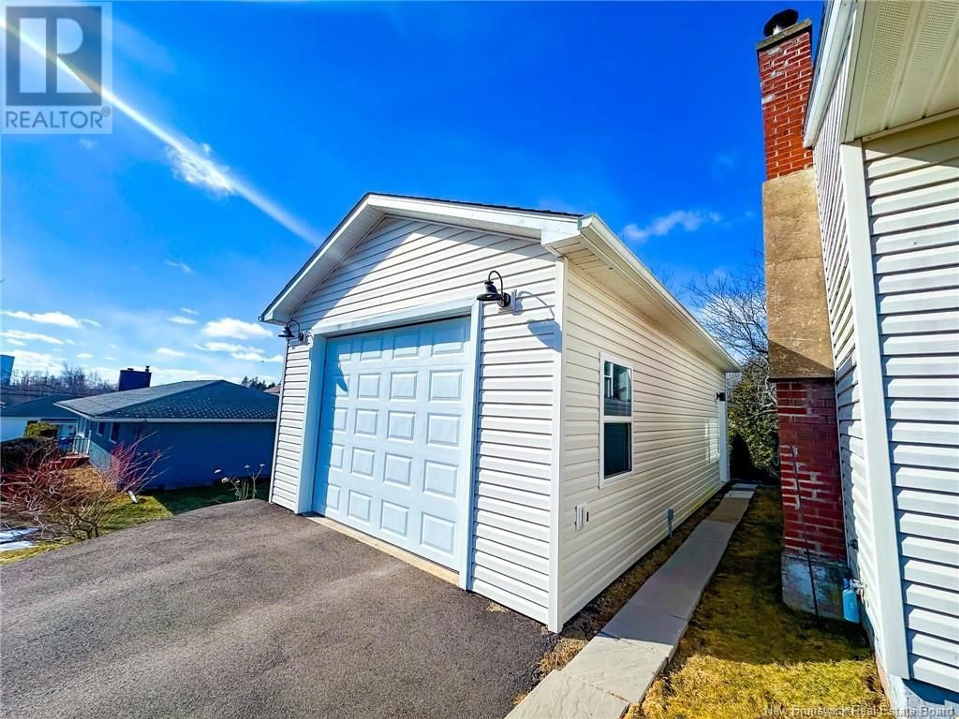 Home with vinyl exterior material, street for 10 DEVON AVENUE, Sackville New Brunswick E4L3W2
