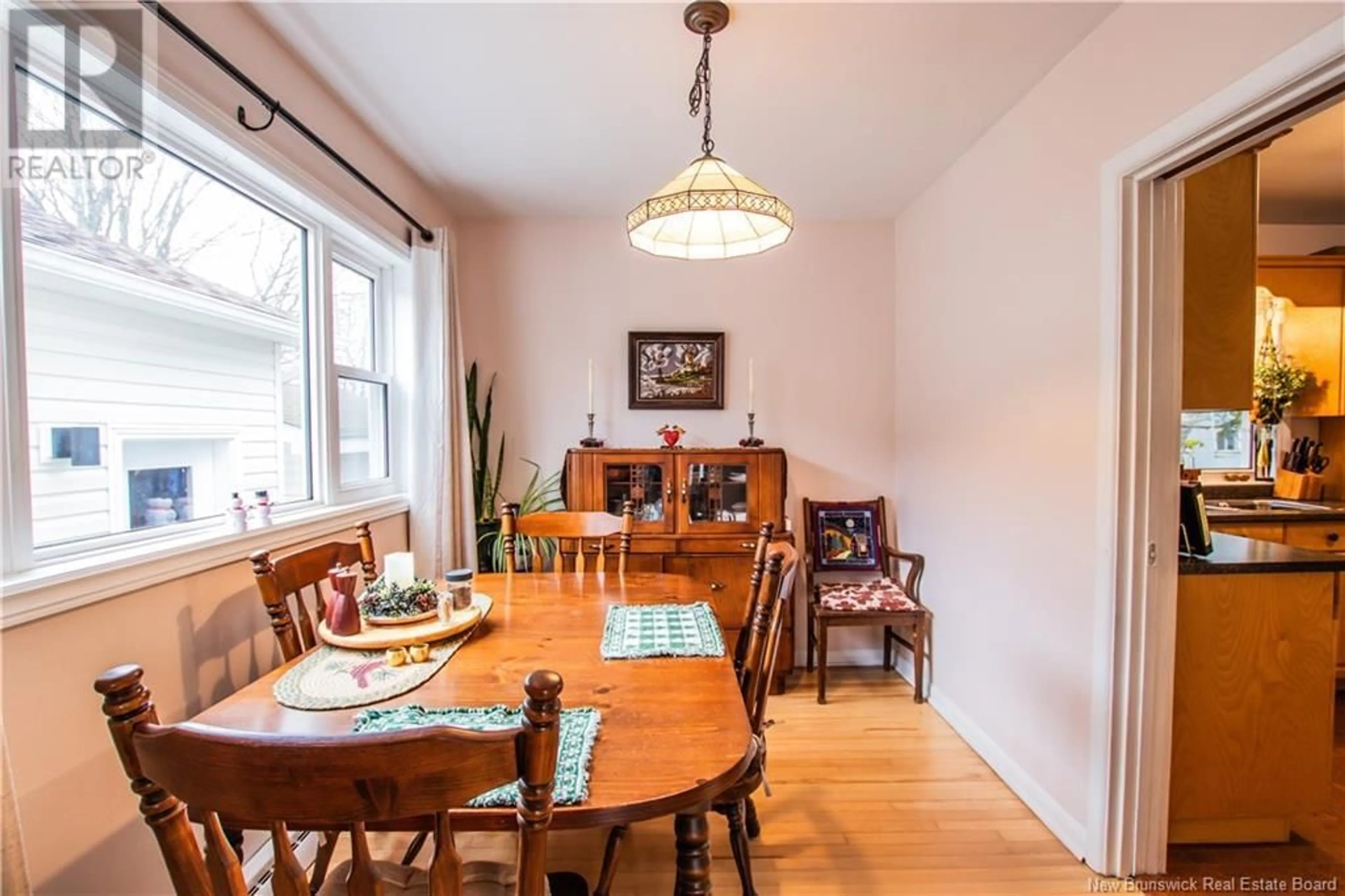 Dining room, wood/laminate floor for 10 DEVON AVENUE, Sackville New Brunswick E4L3W2