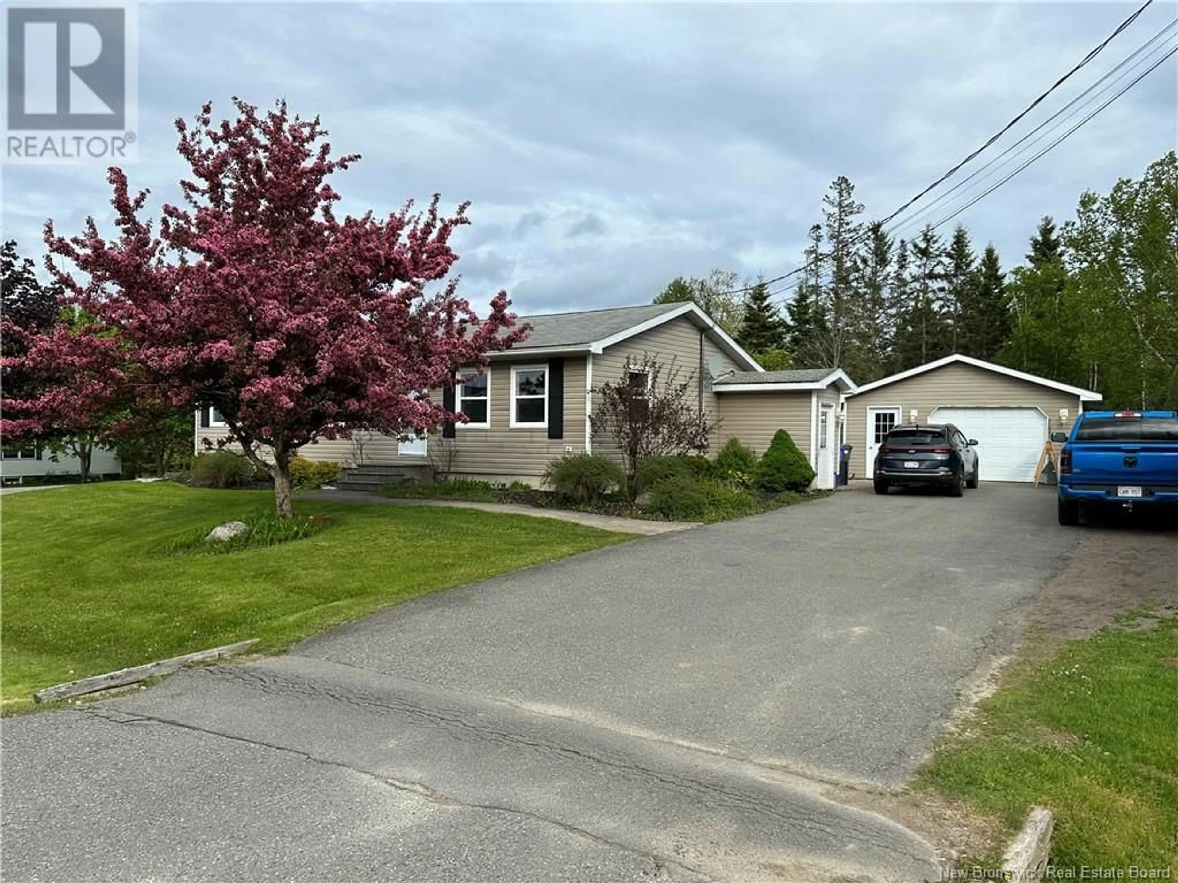 A pic from outside/outdoor area/front of a property/back of a property/a pic from drone, street for 53 DEMONTS AVENUE, Saint Andrews New Brunswick E5B2K3