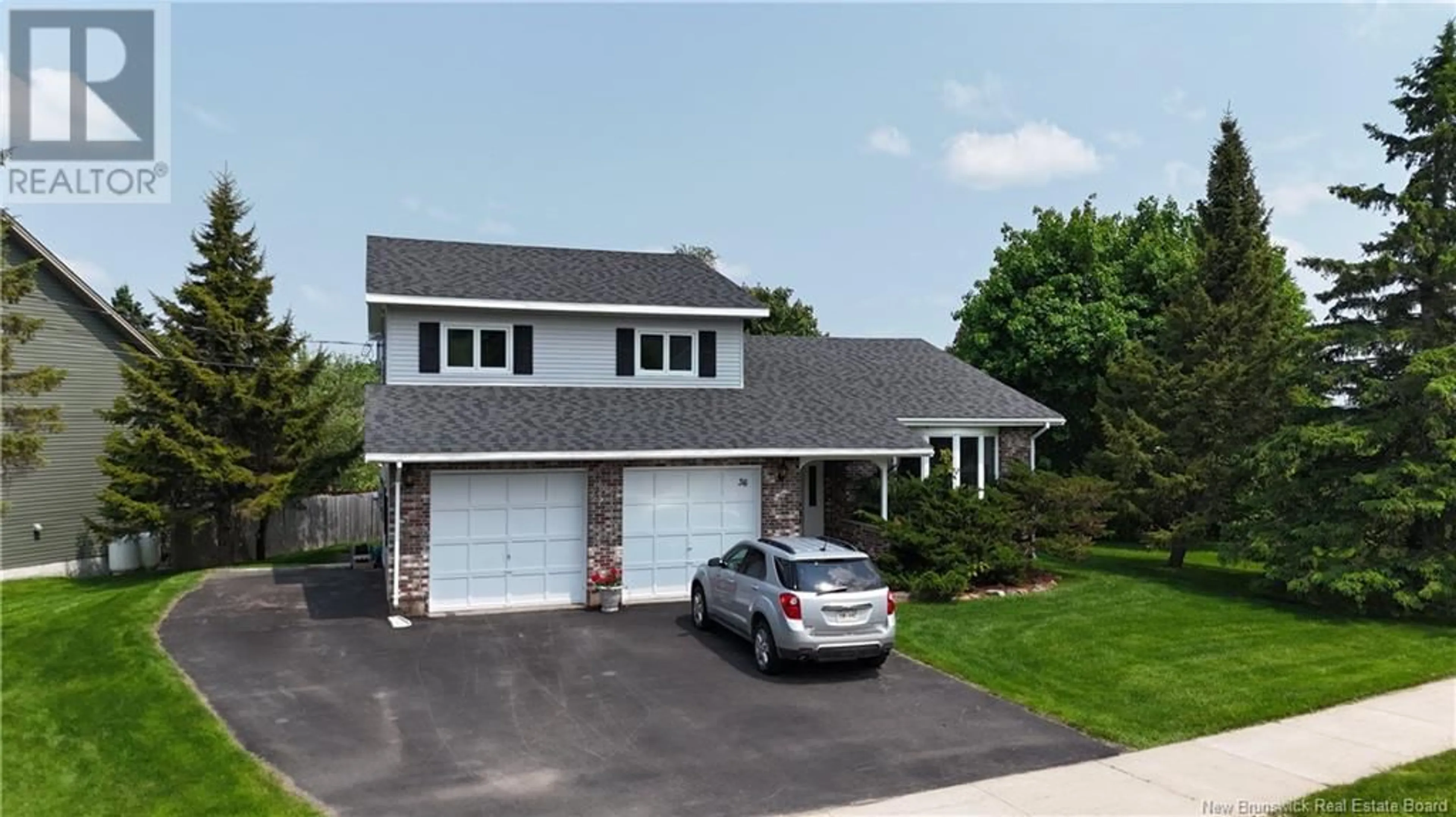 Home with vinyl exterior material, street for 36 MACINTOSH DRIVE, New Maryland New Brunswick E3C1B5