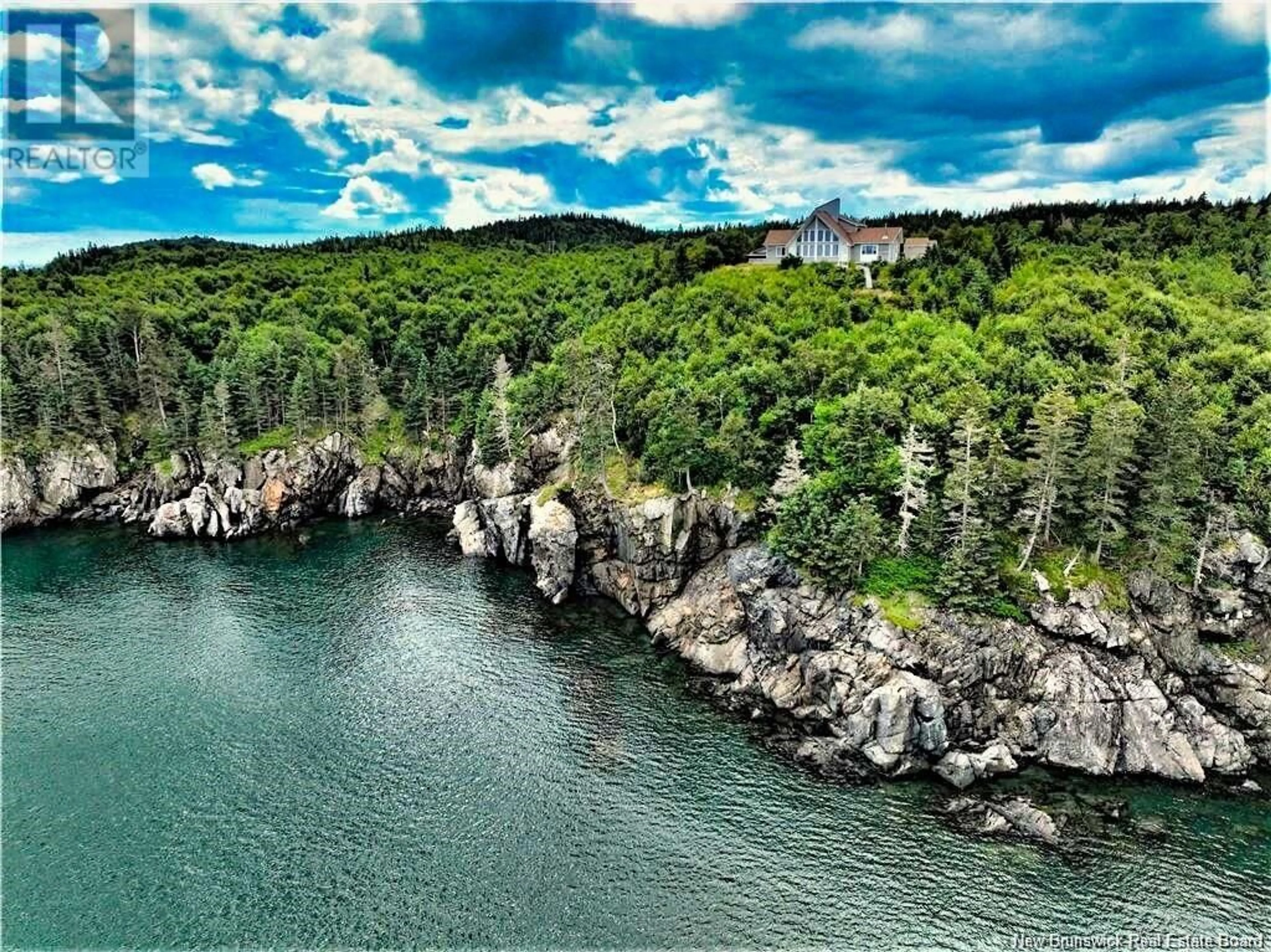 A pic from outside/outdoor area/front of a property/back of a property/a pic from drone, water/lake/river/ocean view for 422 FUNDY DRIVE, Wilsons Beach New Brunswick E5E1X2