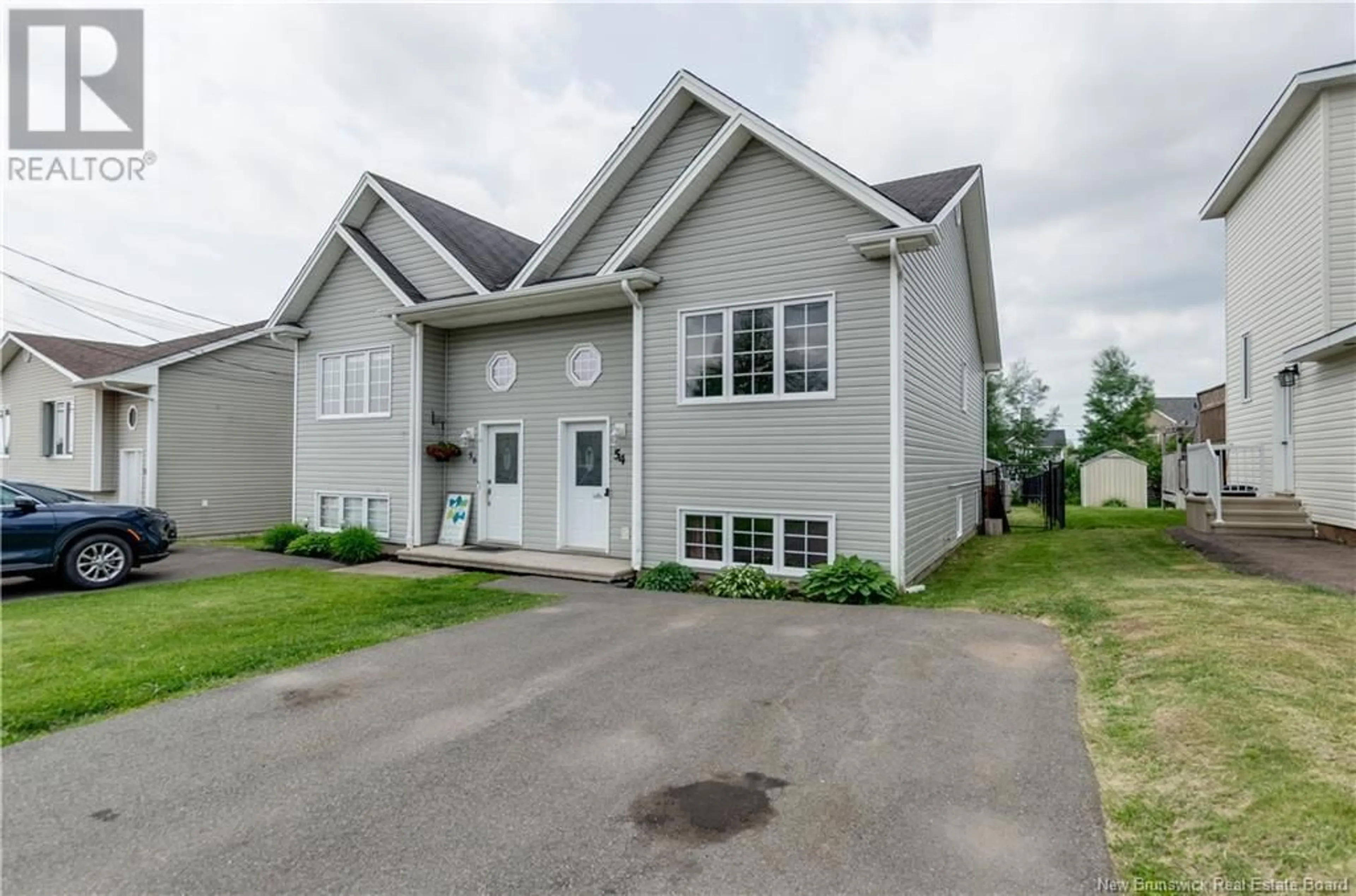 Home with vinyl exterior material, street for 54 PENROSE STREET, Moncton New Brunswick E1E4N9
