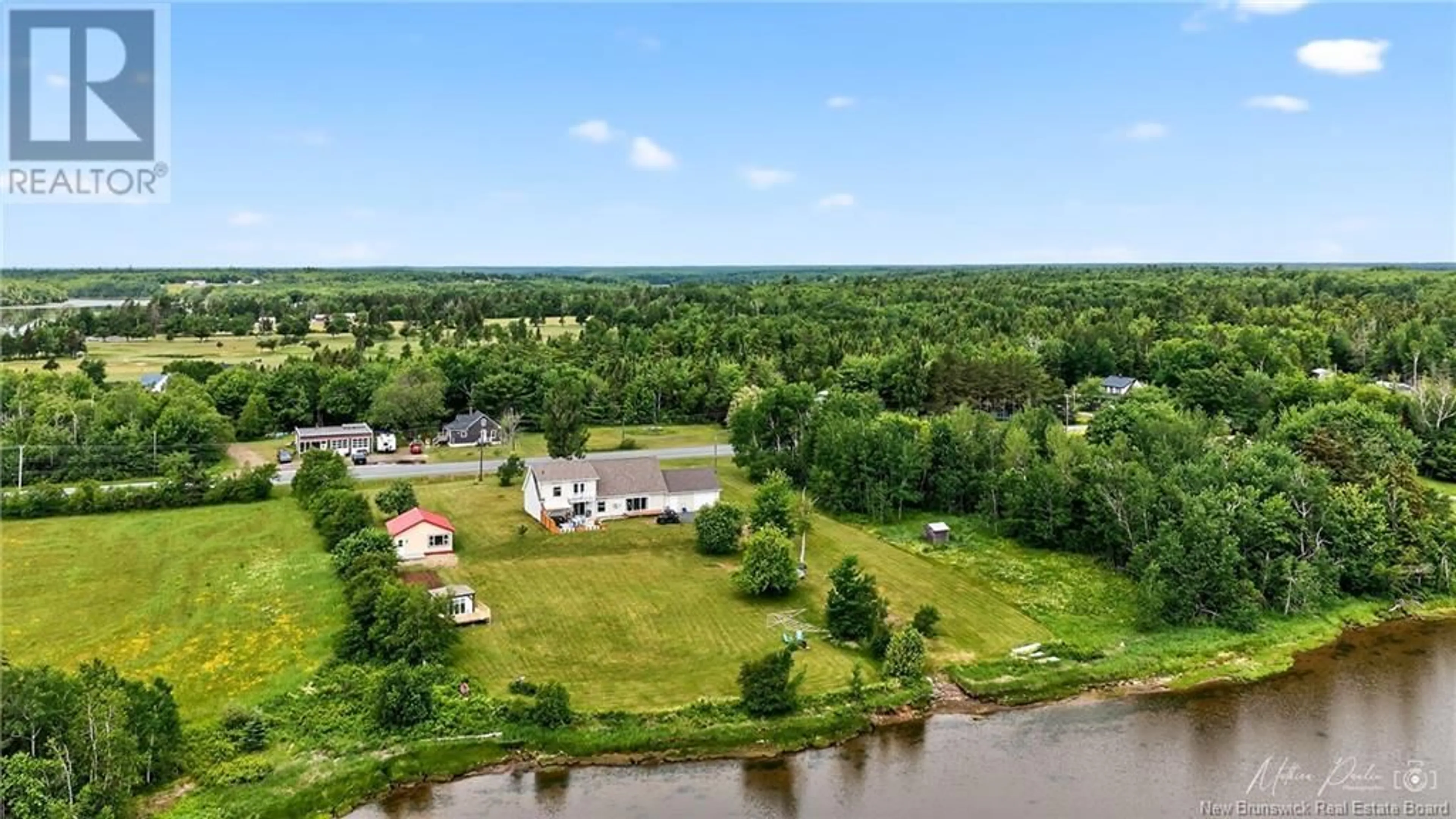 A pic from outside/outdoor area/front of a property/back of a property/a pic from drone, water/lake/river/ocean view for 4646 ROUTE 11, Tabusintac New Brunswick E9H1J5