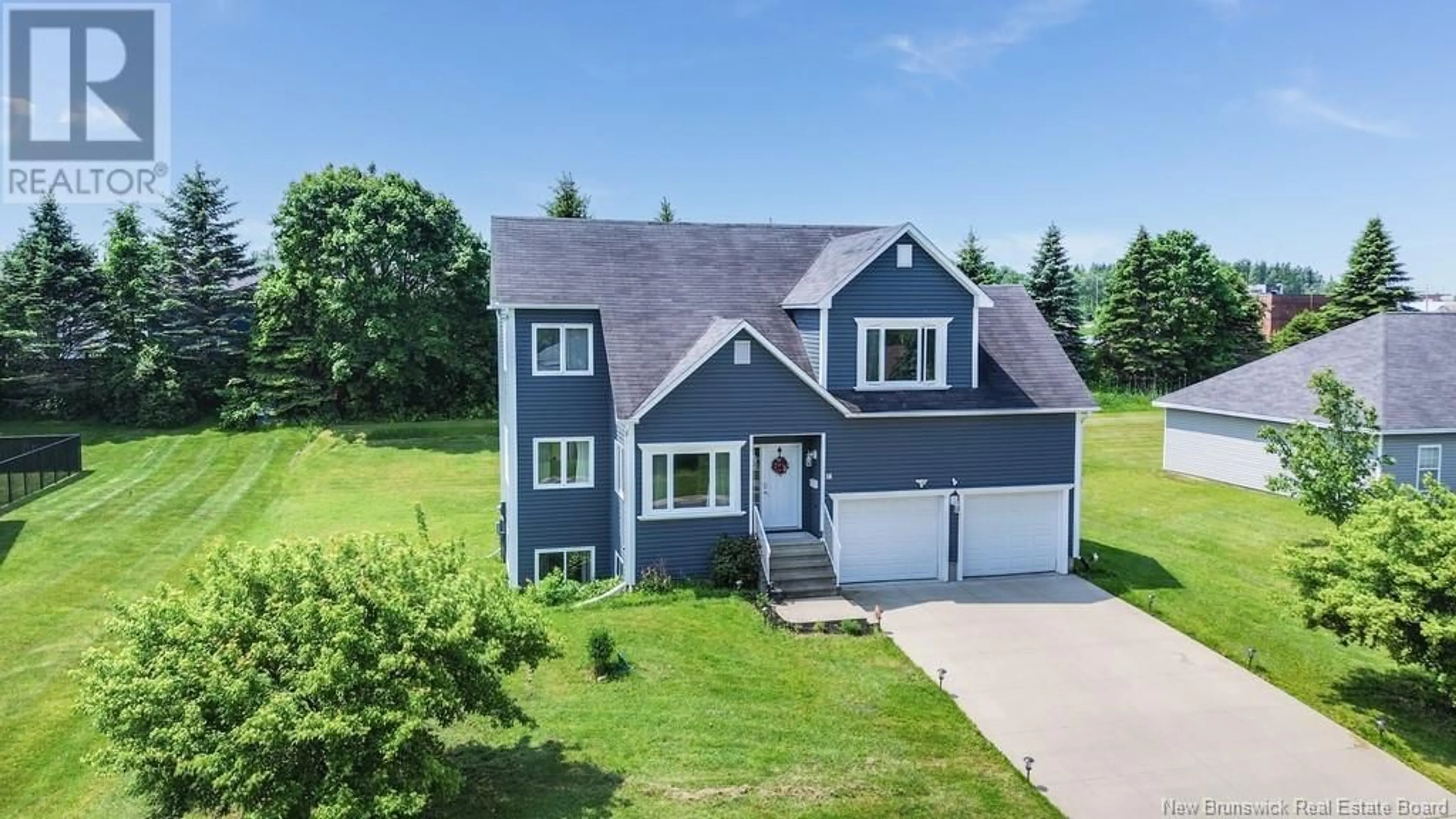 A pic from outside/outdoor area/front of a property/back of a property/a pic from drone, street for 16 HOWE CRESCENT, Oromocto New Brunswick E2V4M5