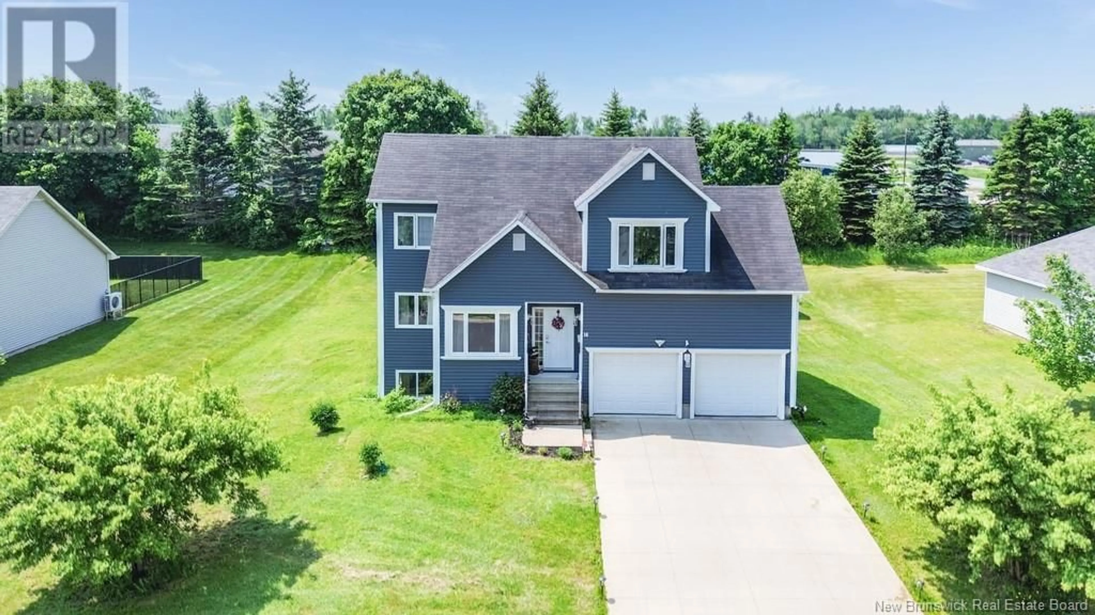 A pic from outside/outdoor area/front of a property/back of a property/a pic from drone, water/lake/river/ocean view for 16 HOWE CRESCENT, Oromocto New Brunswick E2V4M5