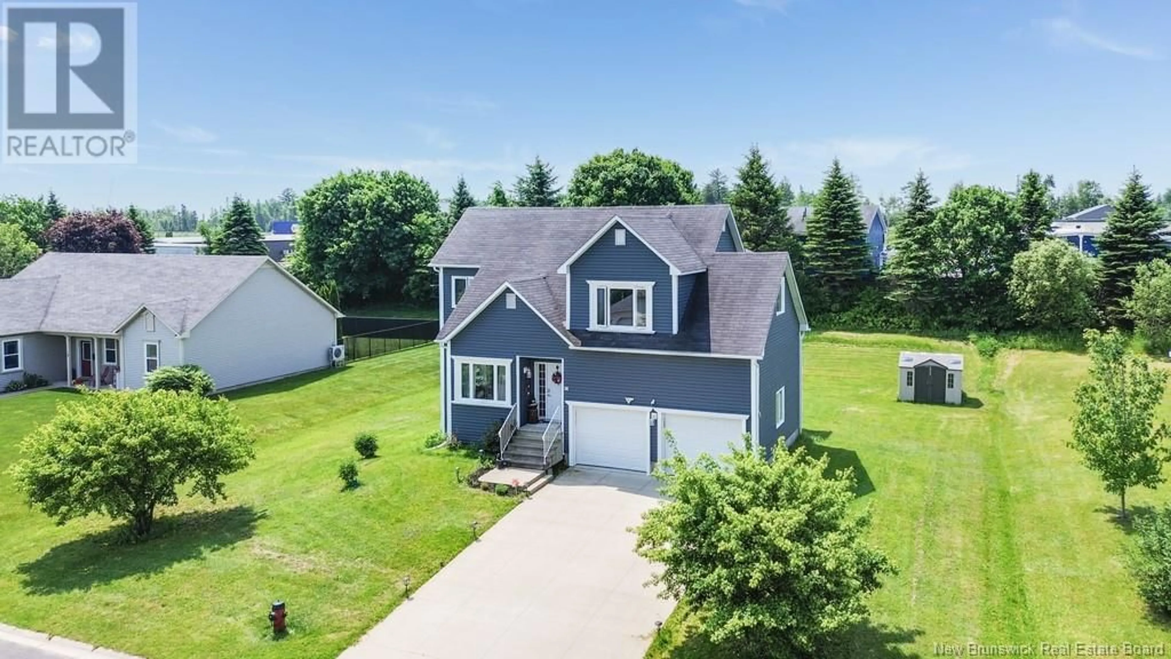 A pic from outside/outdoor area/front of a property/back of a property/a pic from drone, street for 16 HOWE CRESCENT, Oromocto New Brunswick E2V4M5
