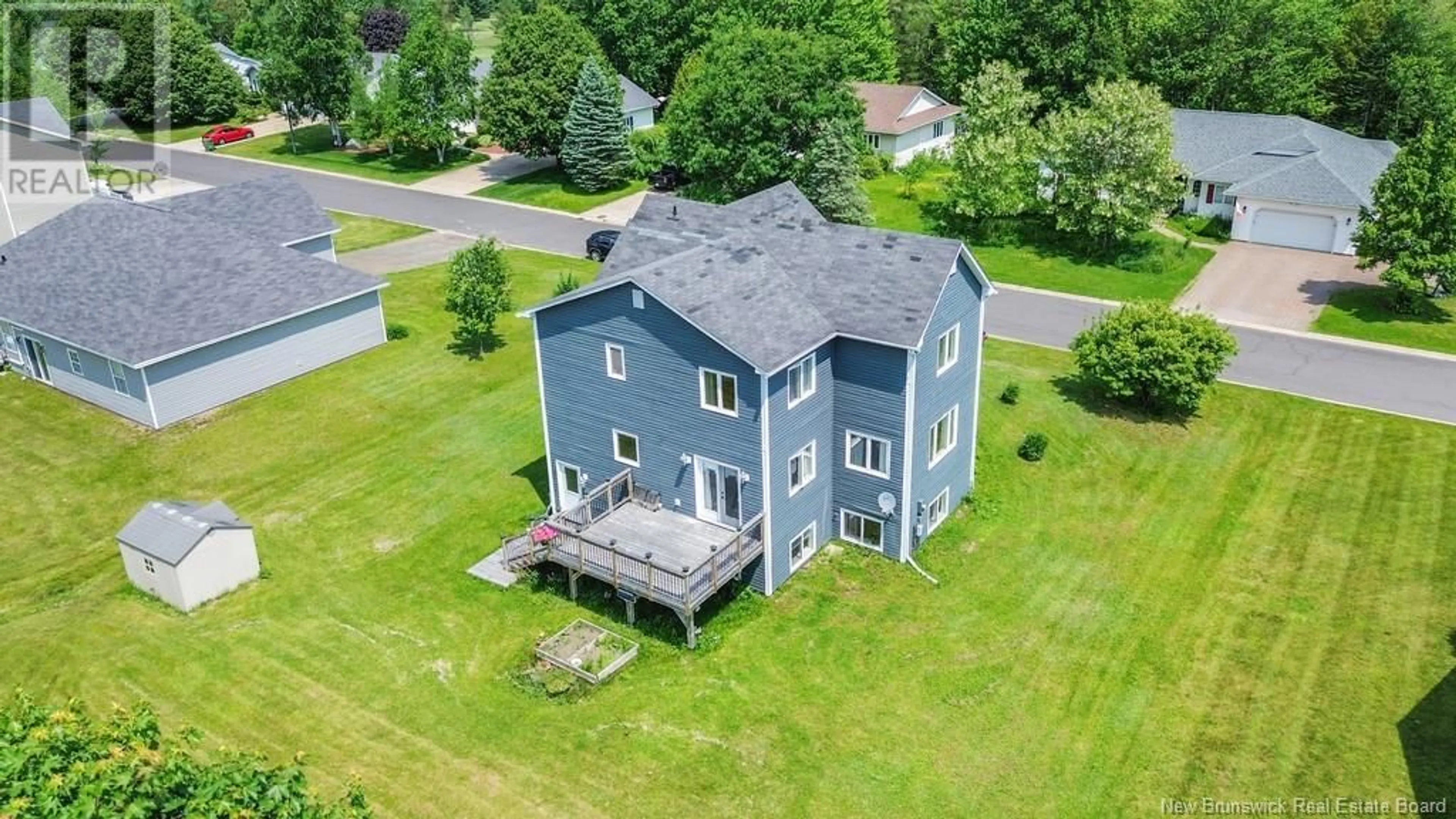 A pic from outside/outdoor area/front of a property/back of a property/a pic from drone, unknown for 16 HOWE CRESCENT, Oromocto New Brunswick E2V4M5