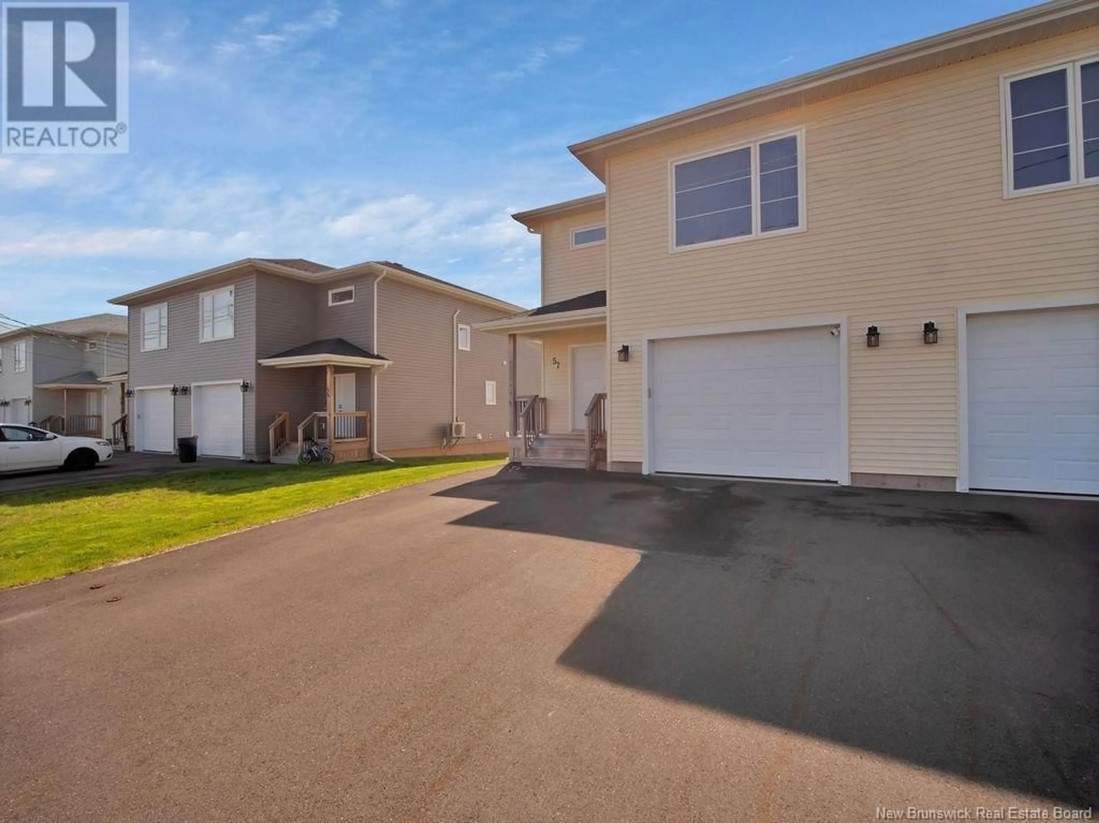 A pic from outside/outdoor area/front of a property/back of a property/a pic from drone, water/lake/river/ocean view for 57 SATLEVILLE CRESCENT, Riverview New Brunswick E1B0V5