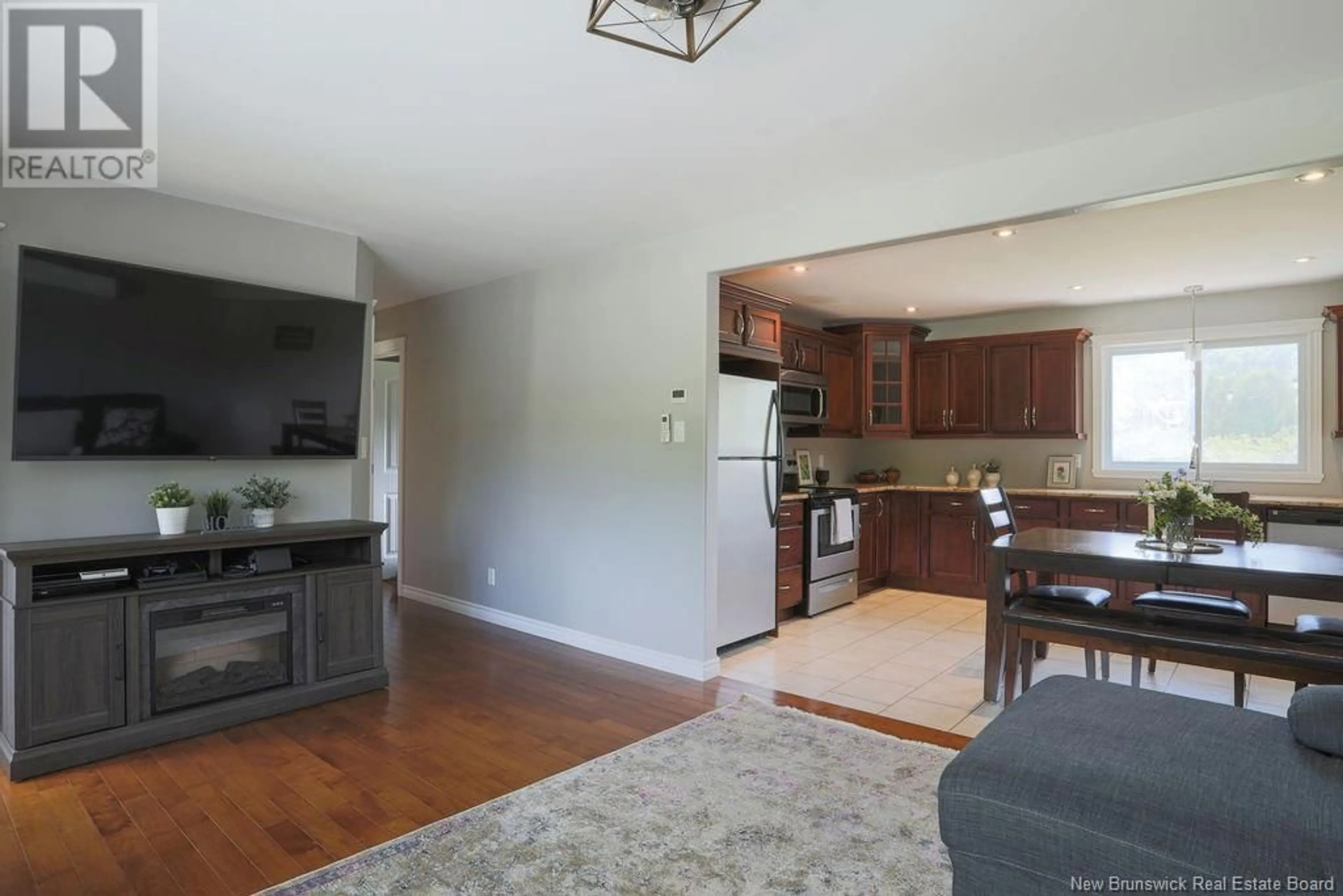 Open concept kitchen, wood/laminate floor for 1850 ROTHESAY ROAD, Rothesay New Brunswick E2H1S5