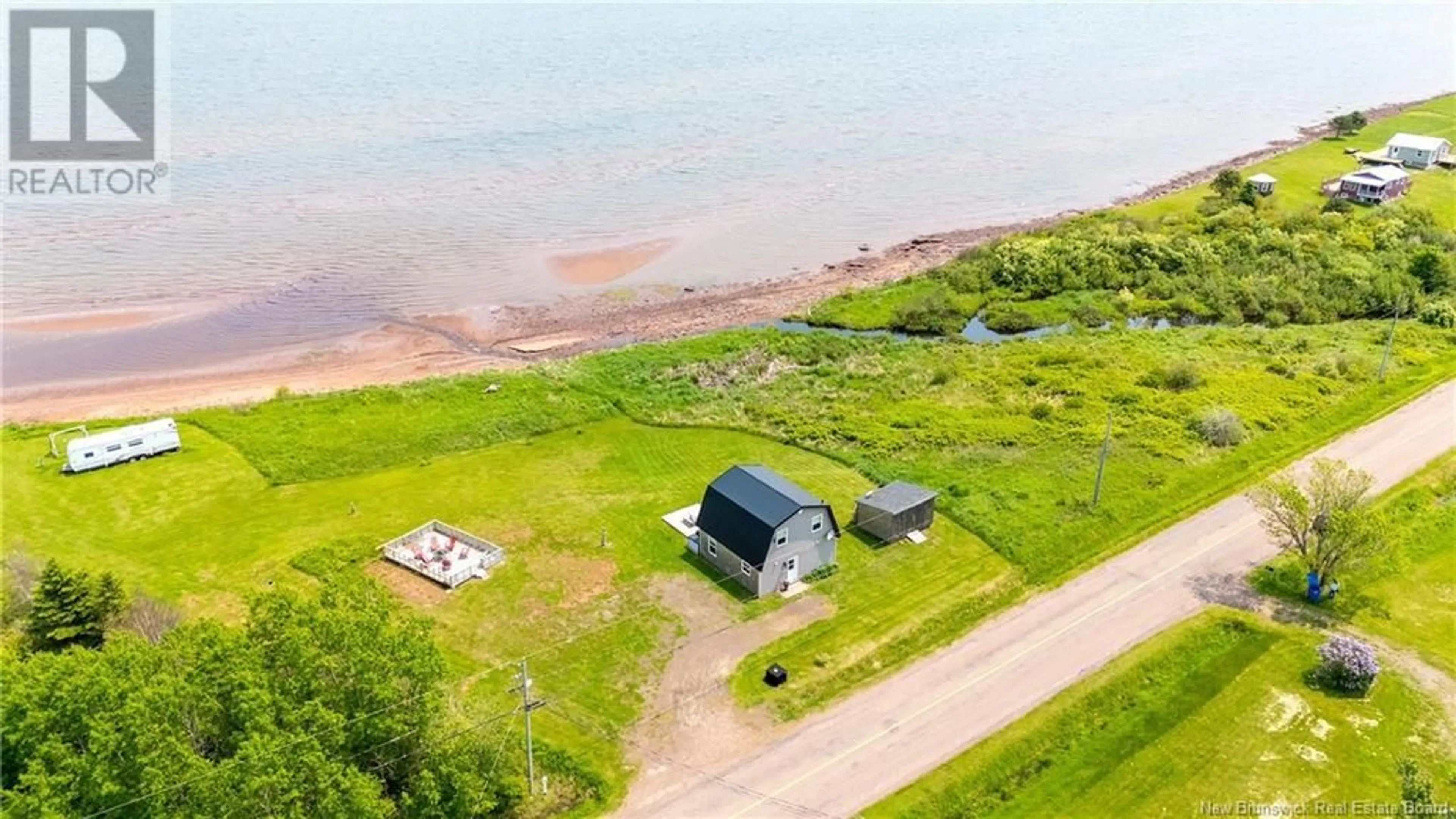 A pic from outside/outdoor area/front of a property/back of a property/a pic from drone, water/lake/river/ocean view for 20 ROUTE 960, Cape Tormentine New Brunswick E4M0C5