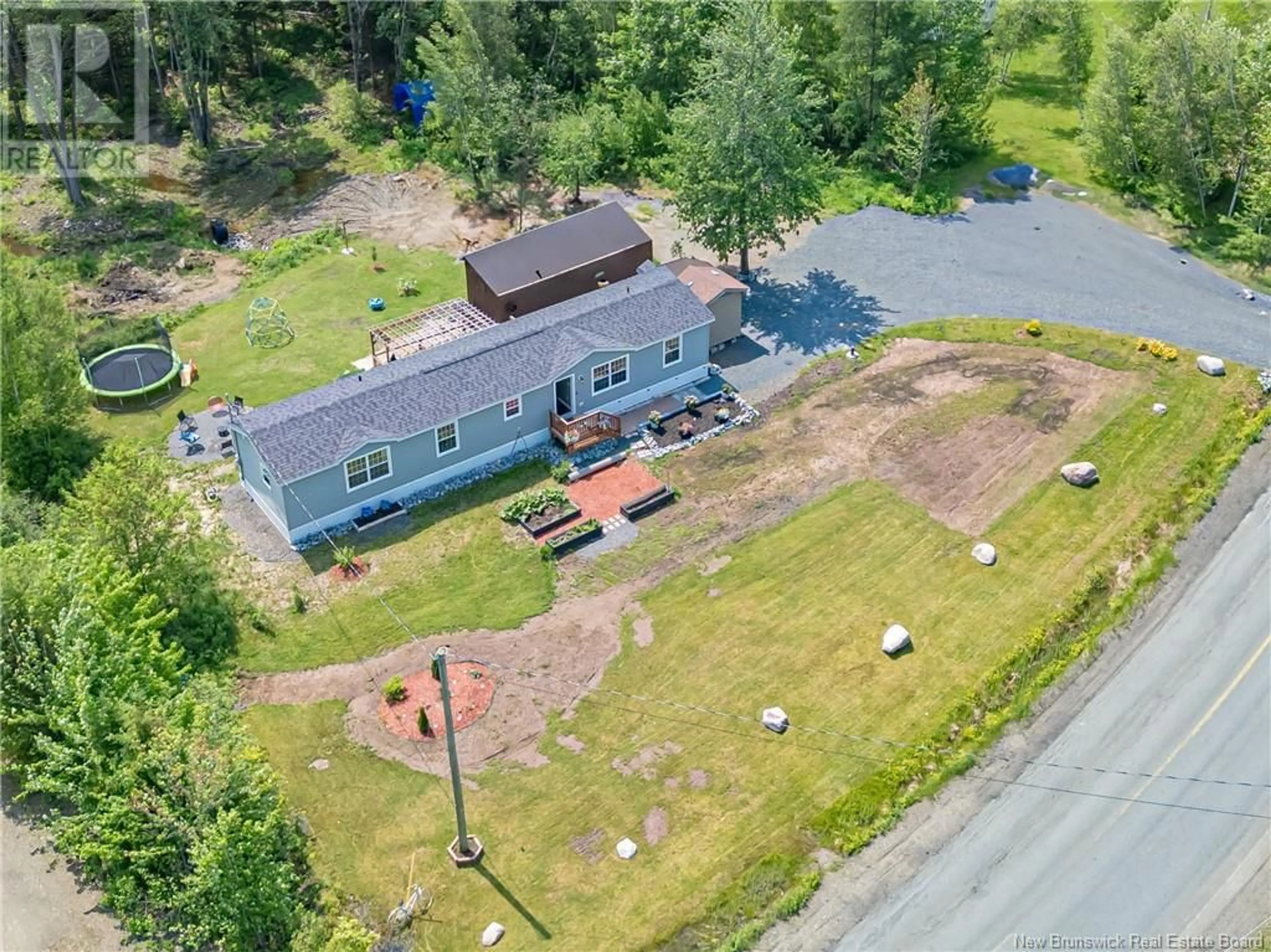 A pic from outside/outdoor area/front of a property/back of a property/a pic from drone, unknown for 1181 ROUTE 655, Waasis New Brunswick E3B9A1