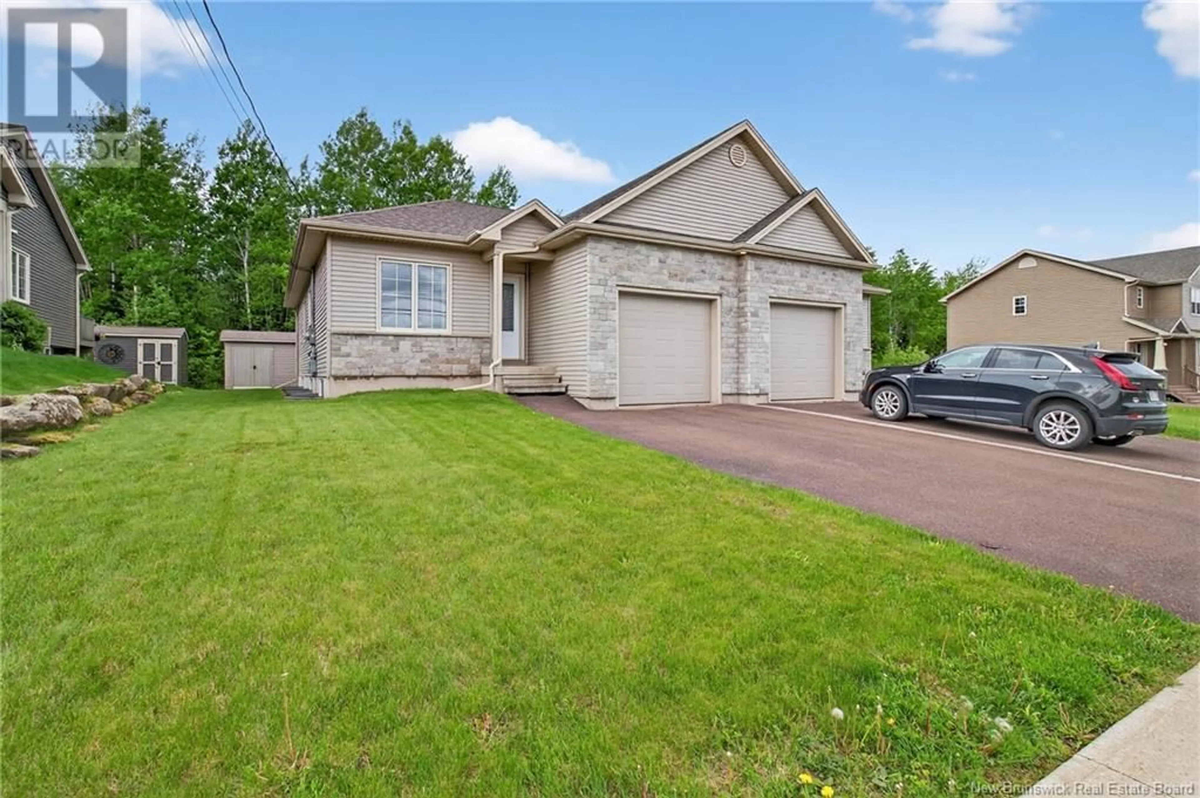 Home with brick exterior material, street for 209 ERINVALE DRIVE, Moncton New Brunswick E1A5S8