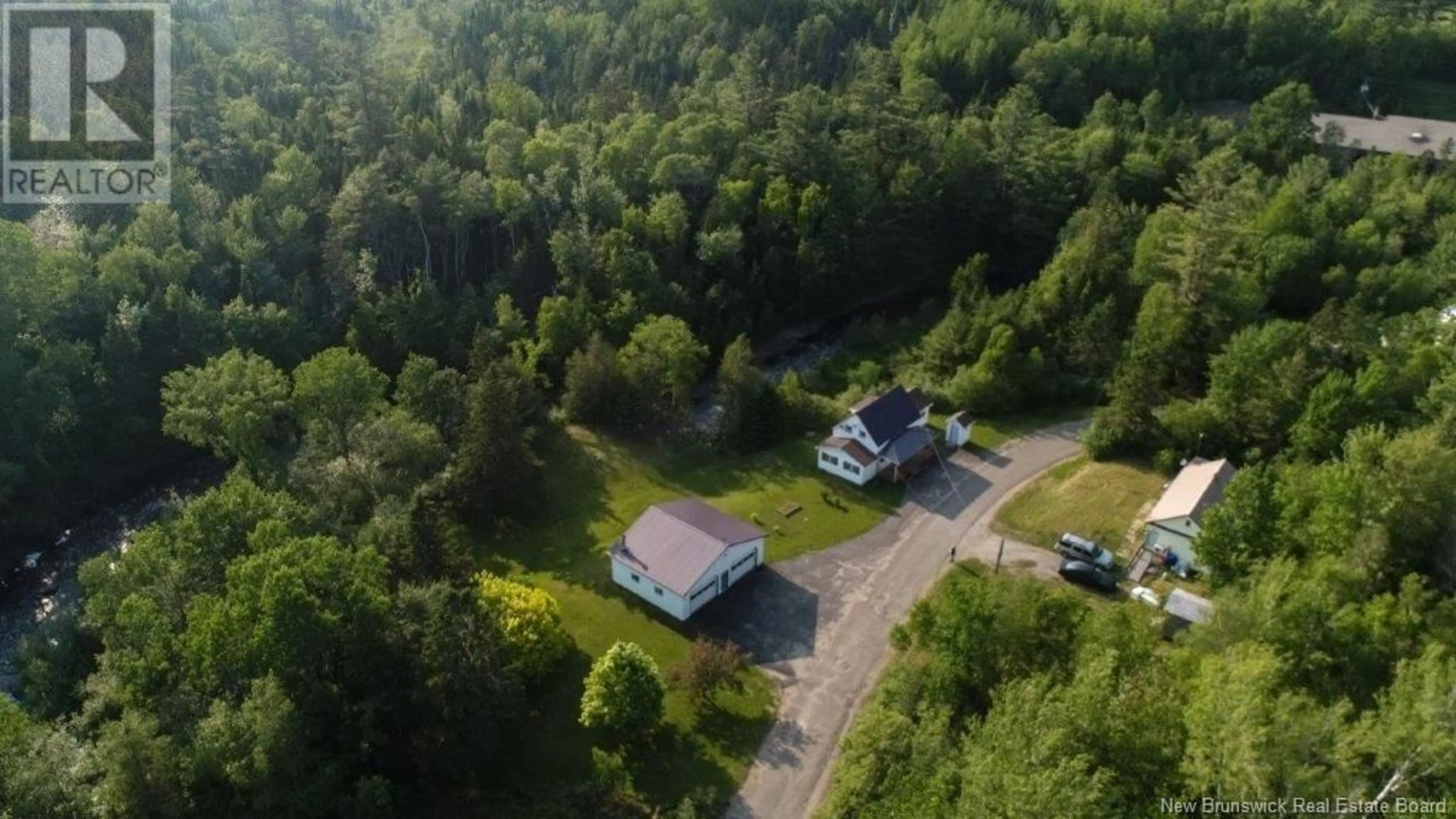 A pic from outside/outdoor area/front of a property/back of a property/a pic from drone, forest/trees view for 15 YORK BYE ROAD, Harvey New Brunswick E6K1J9