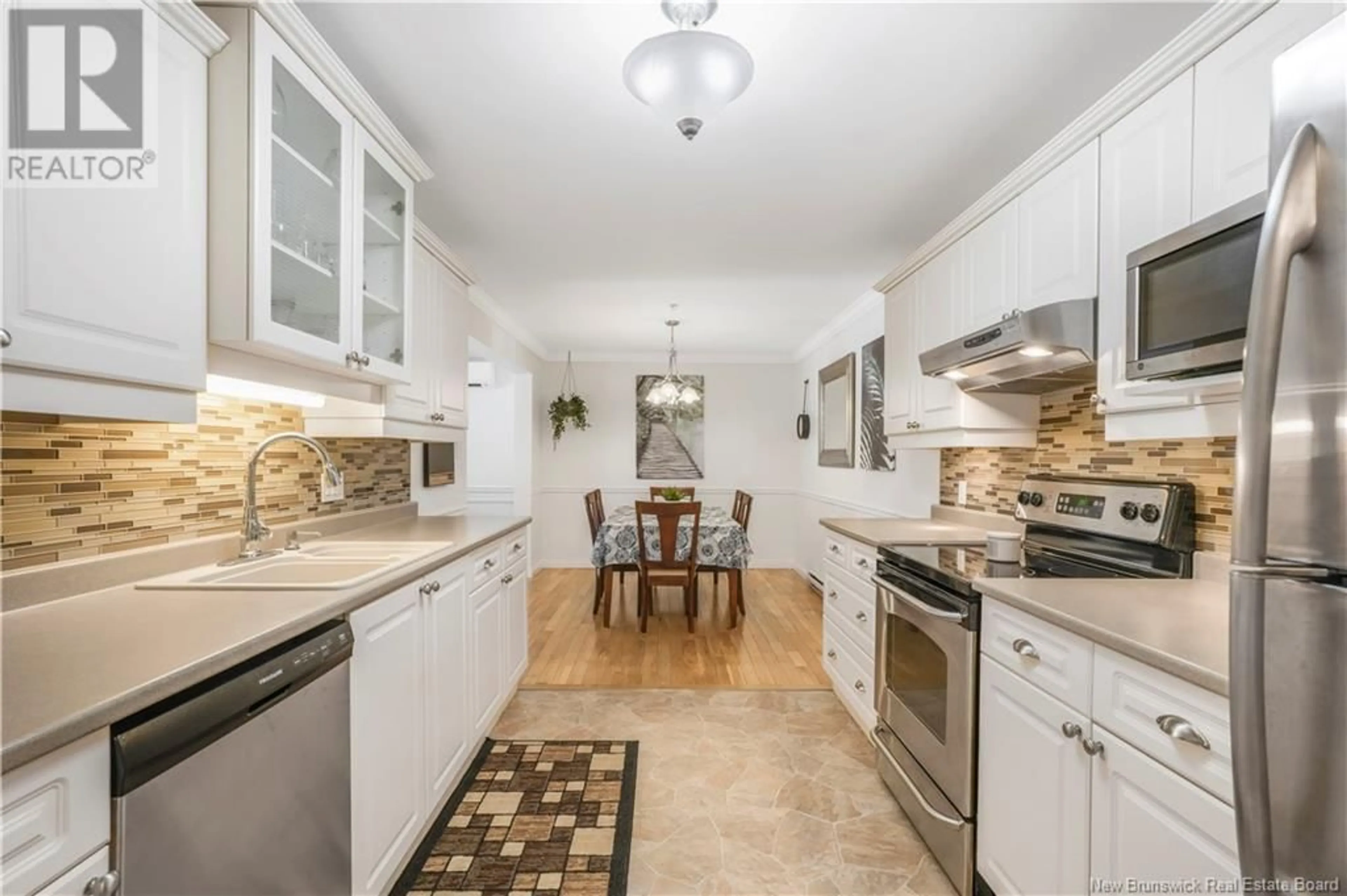 Open concept kitchen, ceramic/tile floor for 107 - 362 CARLETON STREET, Fredericton New Brunswick E3B0C8