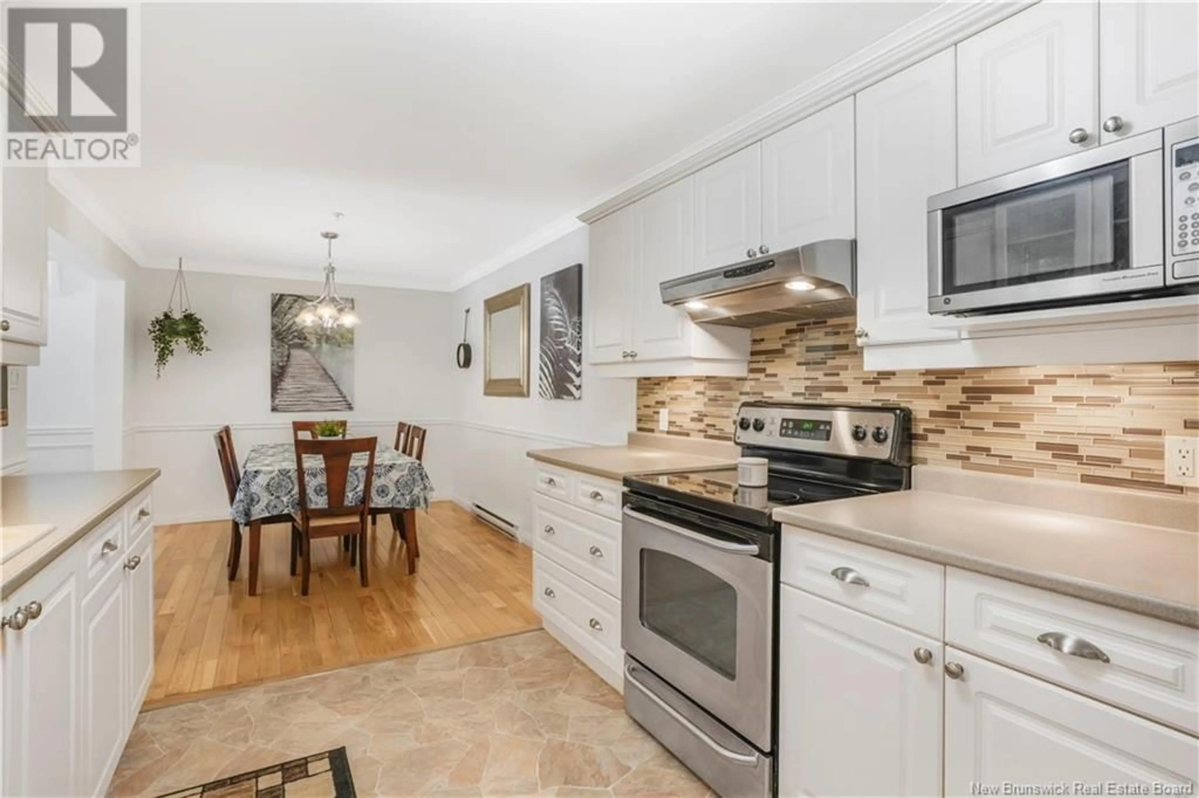 Open concept kitchen, ceramic/tile floor for 107 - 362 CARLETON STREET, Fredericton New Brunswick E3B0C8