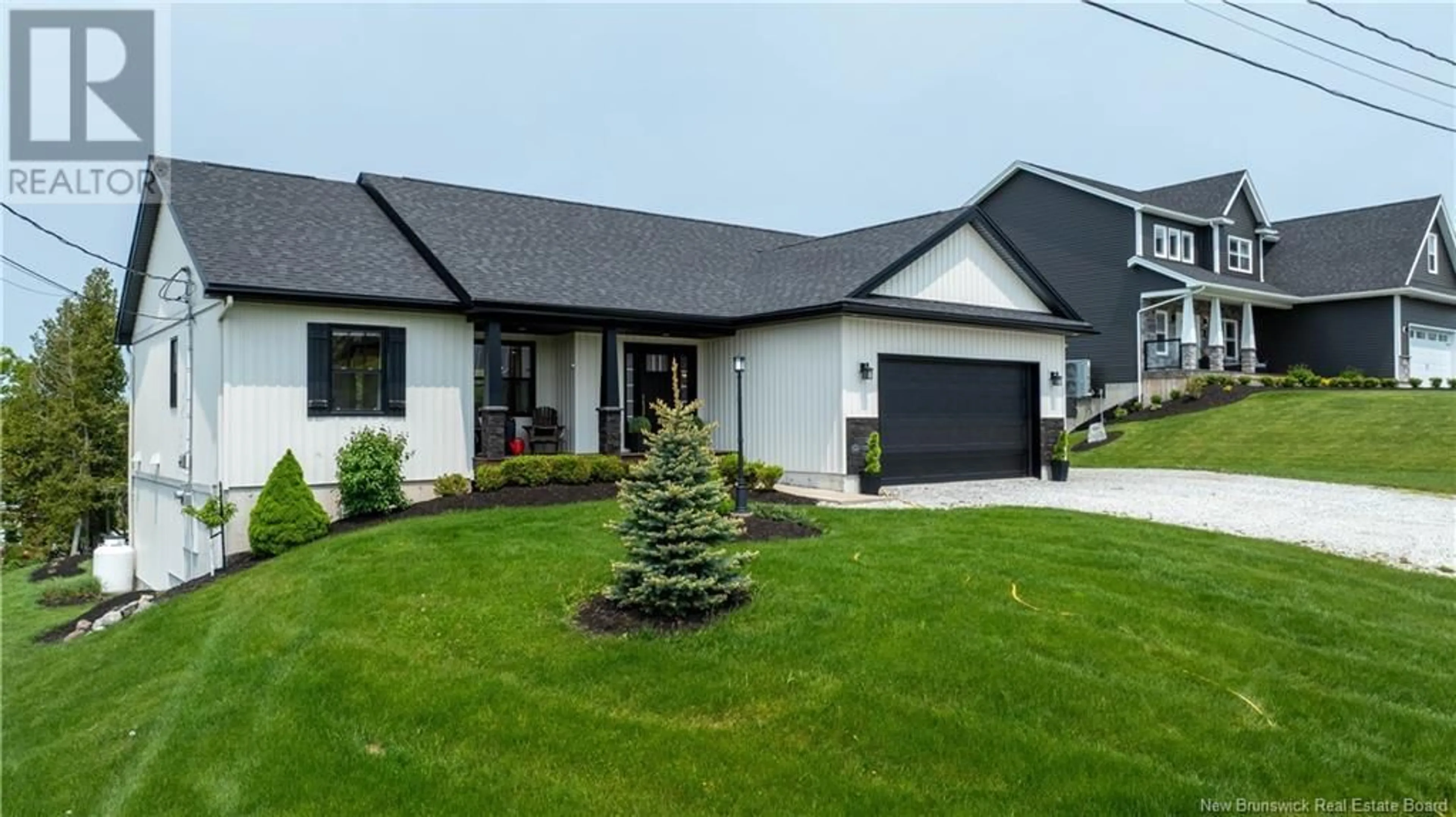 Home with vinyl exterior material, street for 3 FLAGSTONE DRIVE, Quispamsis New Brunswick E2G0B7