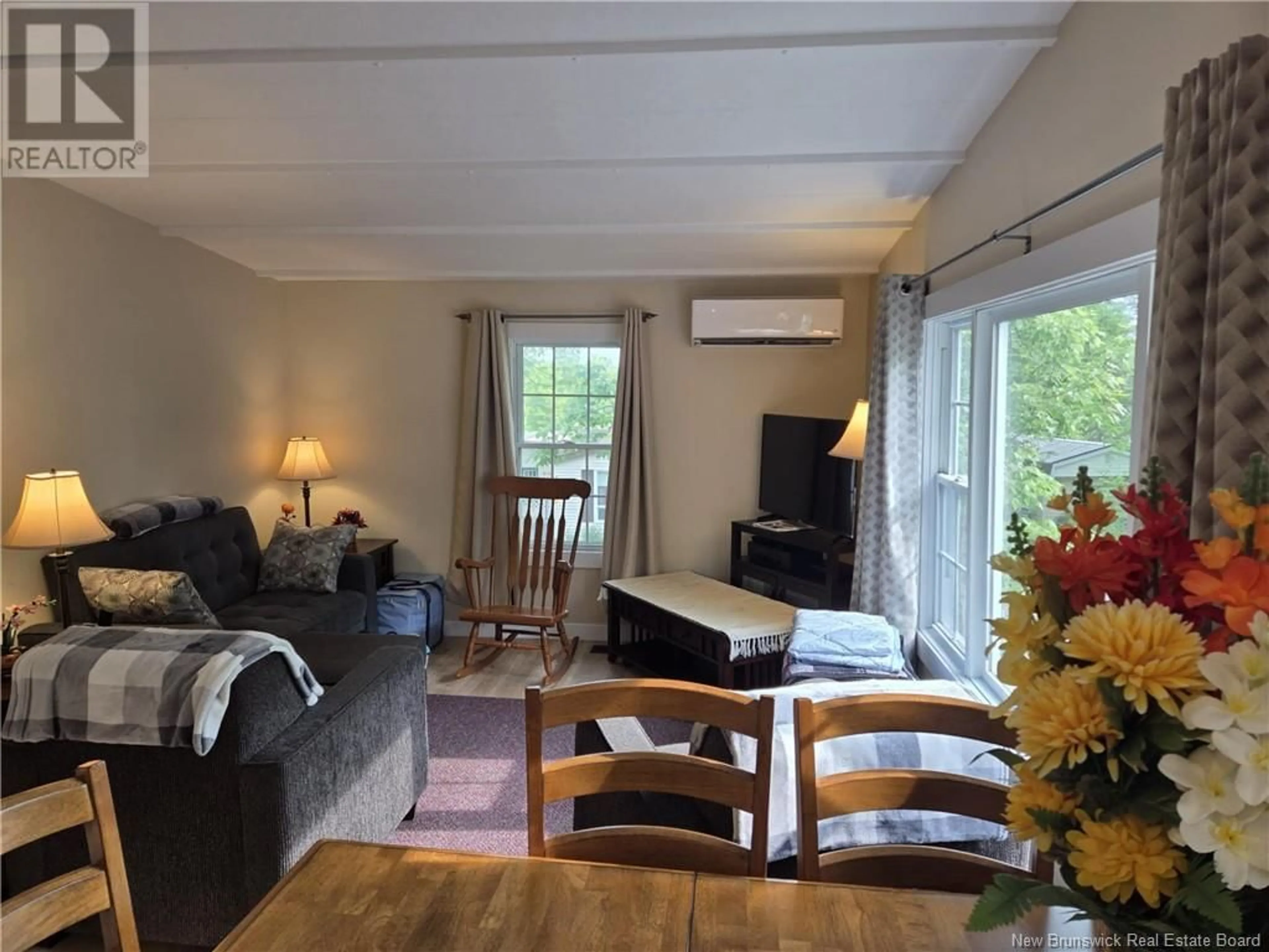 Living room with furniture, wood/laminate floor for 318 GOVERNOR LANE, Fredericton New Brunswick E3B7K9