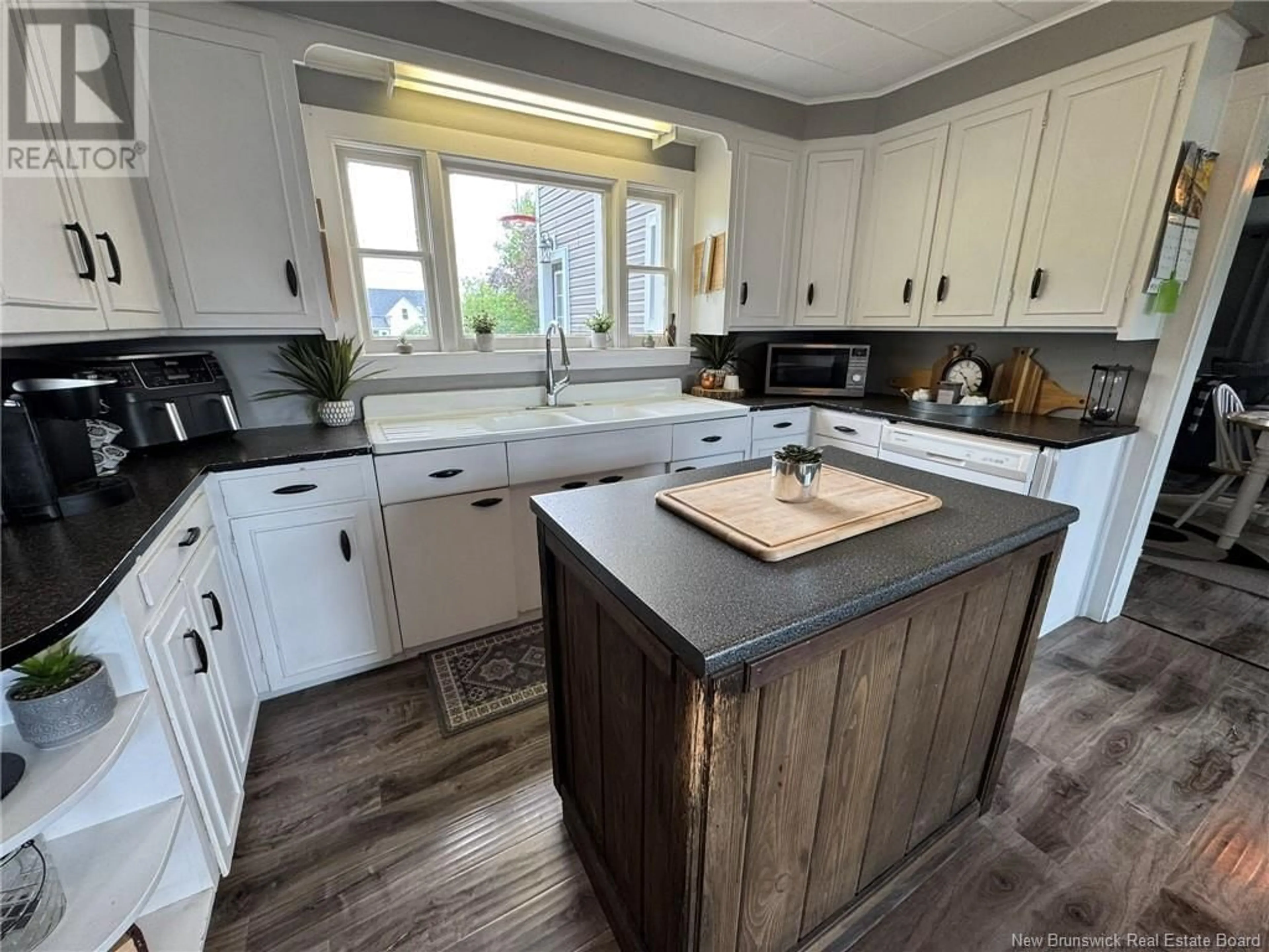 Open concept kitchen, wood/laminate floor for 2677 103 ROUTE, Somerville New Brunswick E7P3A6