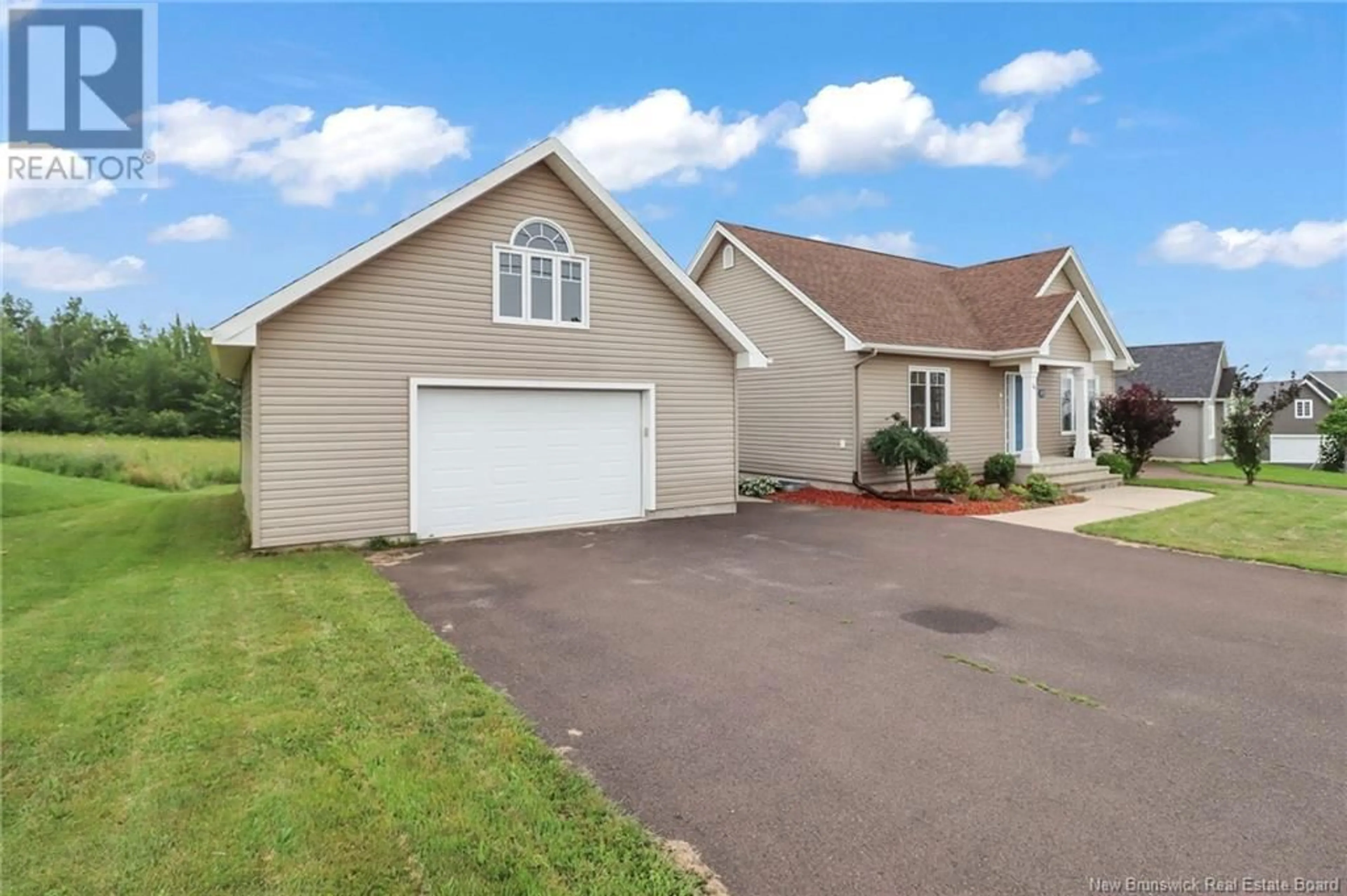 Home with vinyl exterior material, street for 26 MARCO STREET, Dieppe New Brunswick E1A0X2