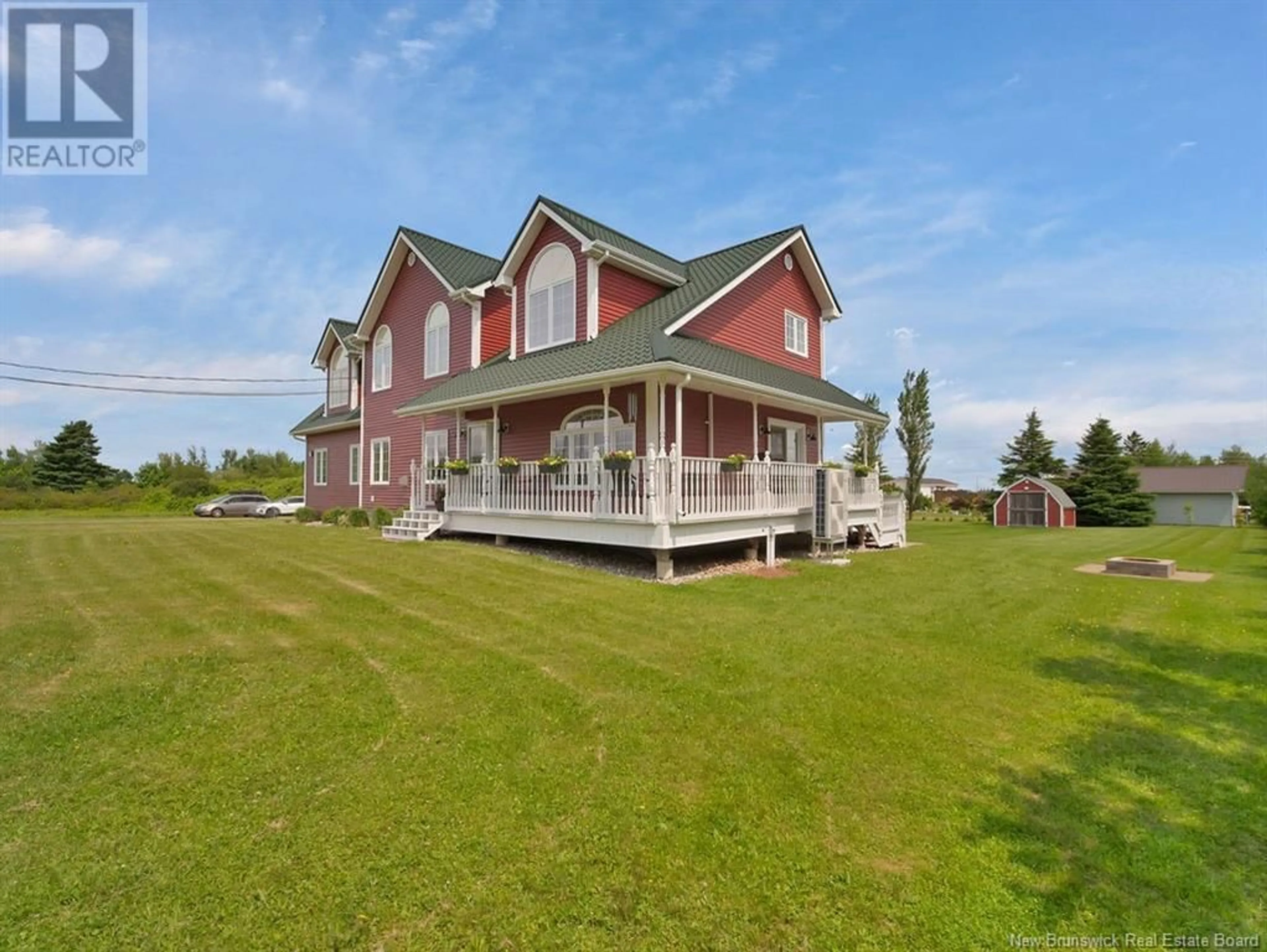 A pic from outside/outdoor area/front of a property/back of a property/a pic from drone, water/lake/river/ocean view for 17 LEO EMILE STREET, Petit-Cap New Brunswick E4N2G1