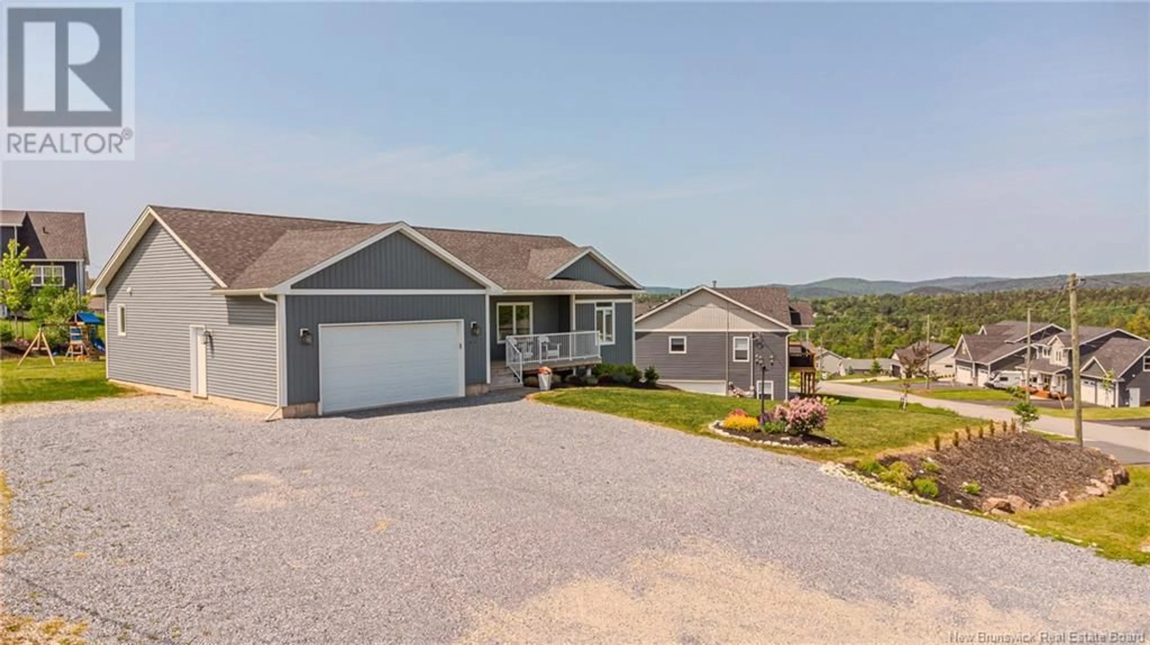 A pic from outside/outdoor area/front of a property/back of a property/a pic from drone, unknown for 20 FLAGSTONE DRIVE, Quispamsis New Brunswick E2G0B7